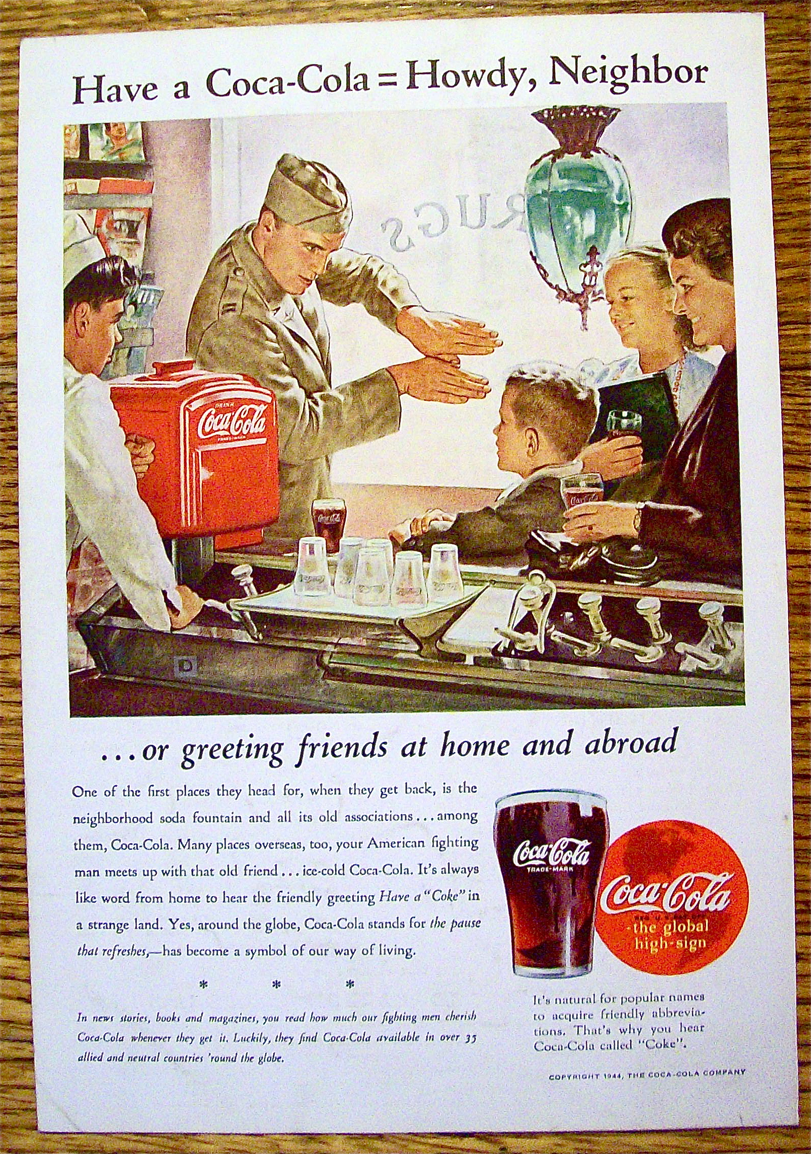1944 Coca Cola (Coke) with a Soldier Talking to a Boy