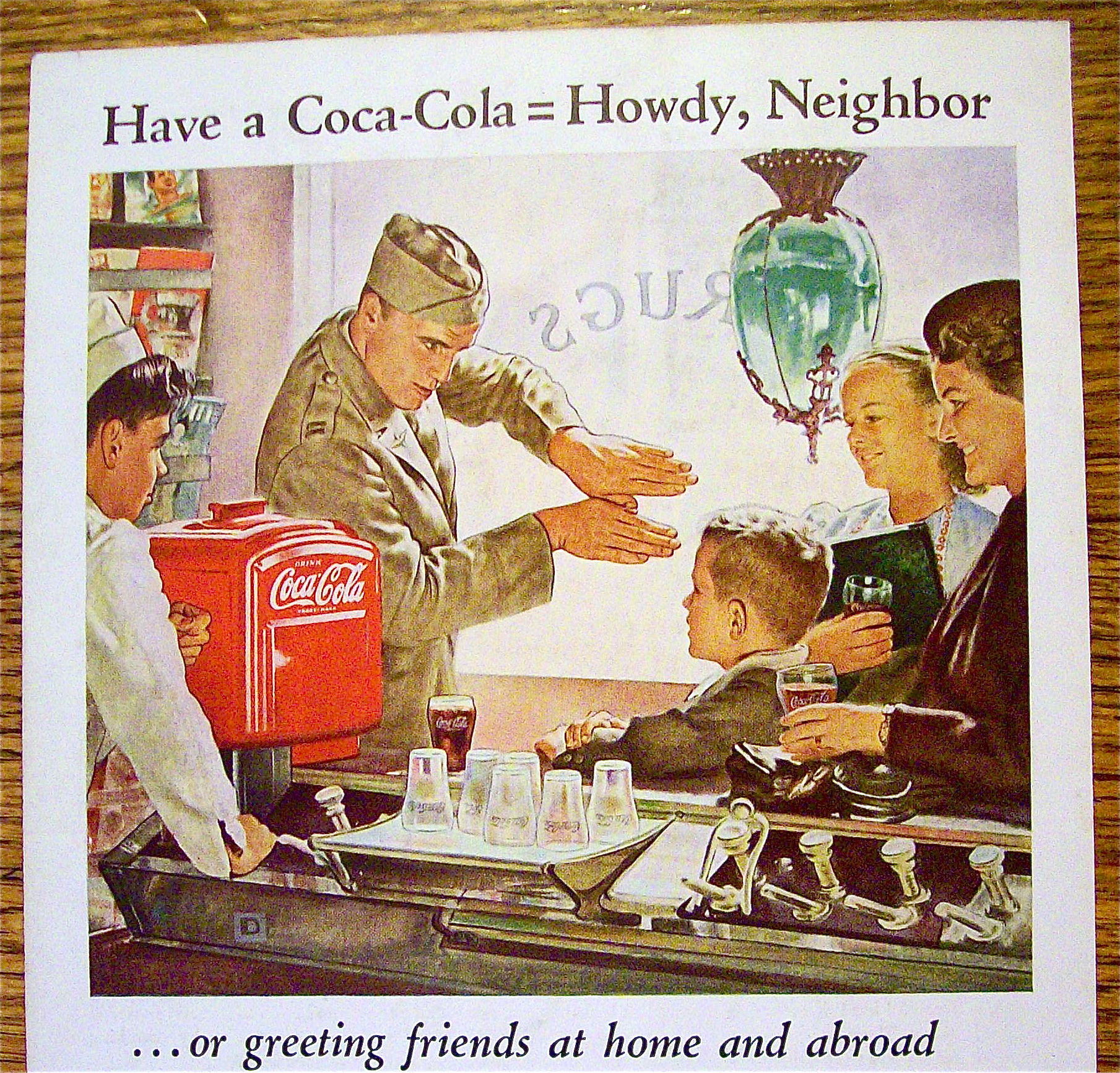 1944 Coca Cola (Coke) with a Soldier Talking to a Boy