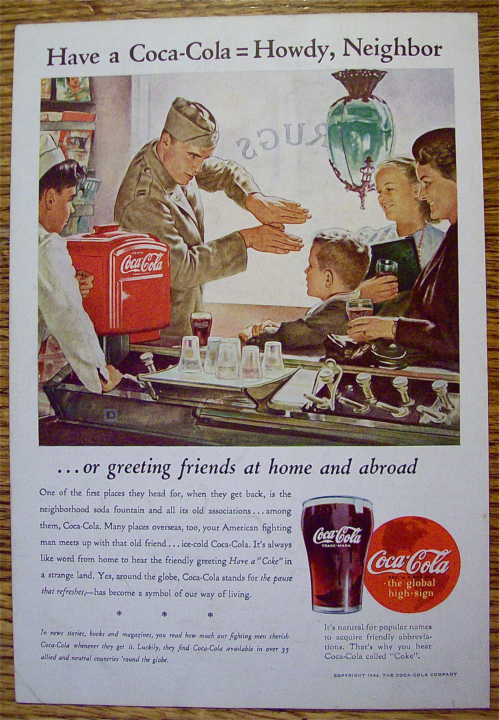 1944 Coca Cola (Coke) with a Soldier Talking to a Boy