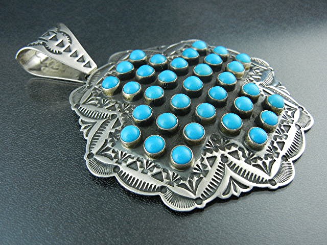 Native American Sterling Silver Turquoise Sunshine Reev