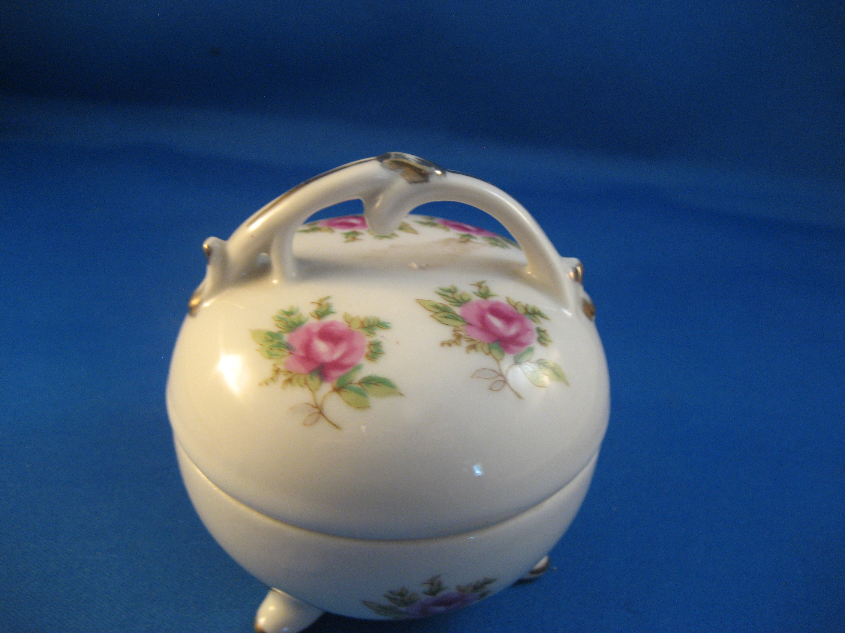 Porcelain Covered Candle Holder