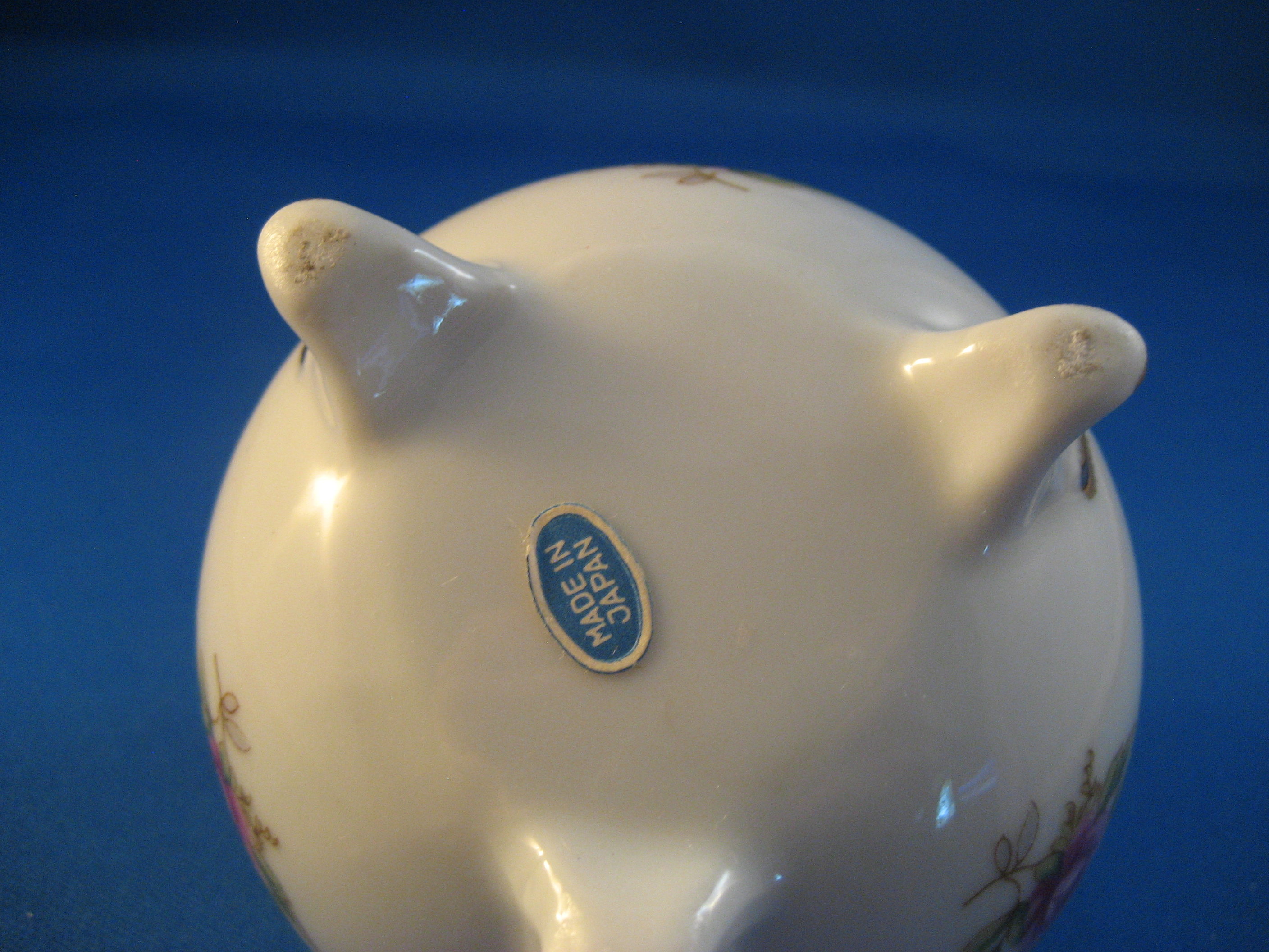 Porcelain Covered Candle Holder