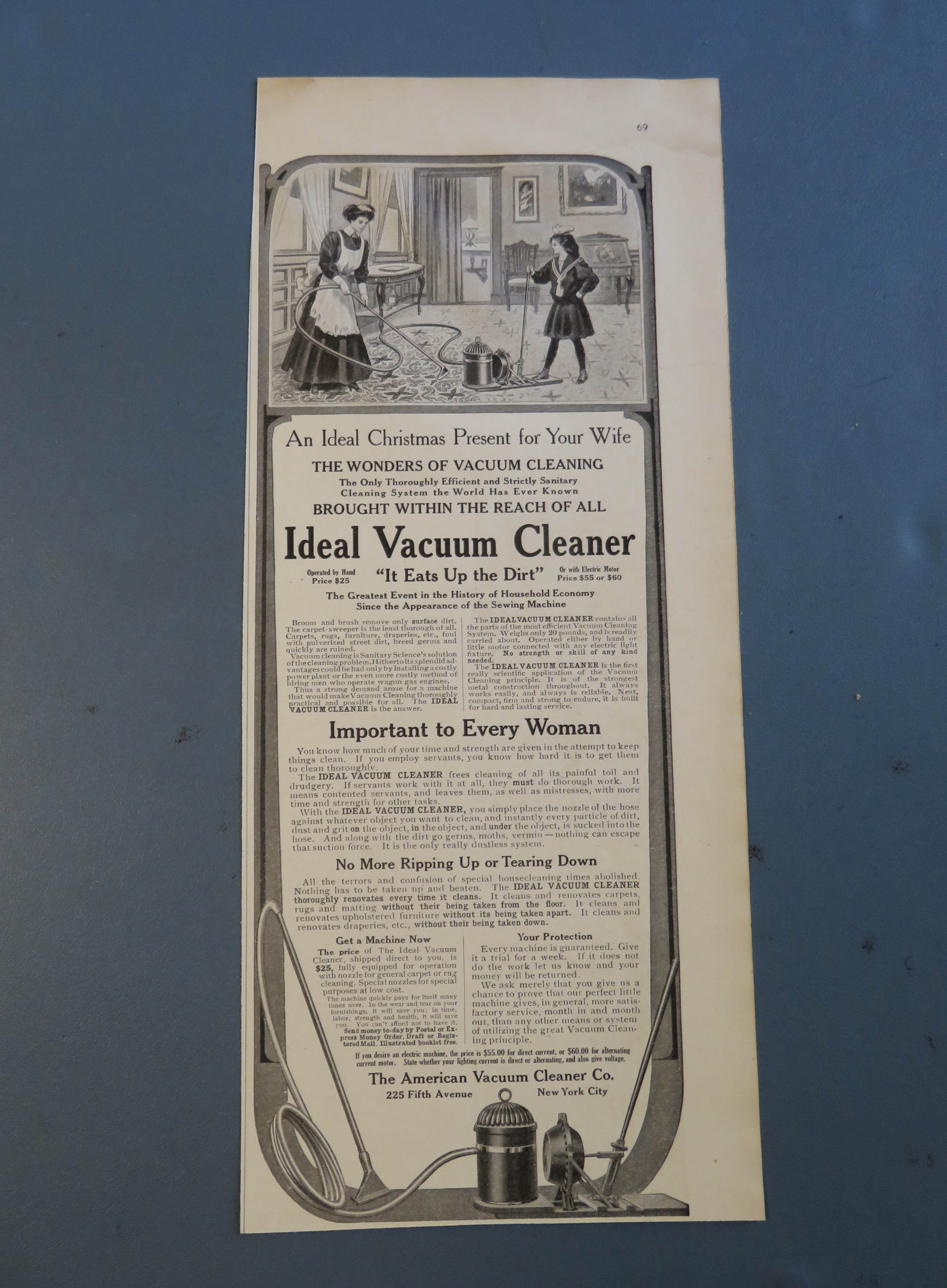 1908 Ideal Vacuum Cleaner with Woman Vacuuming