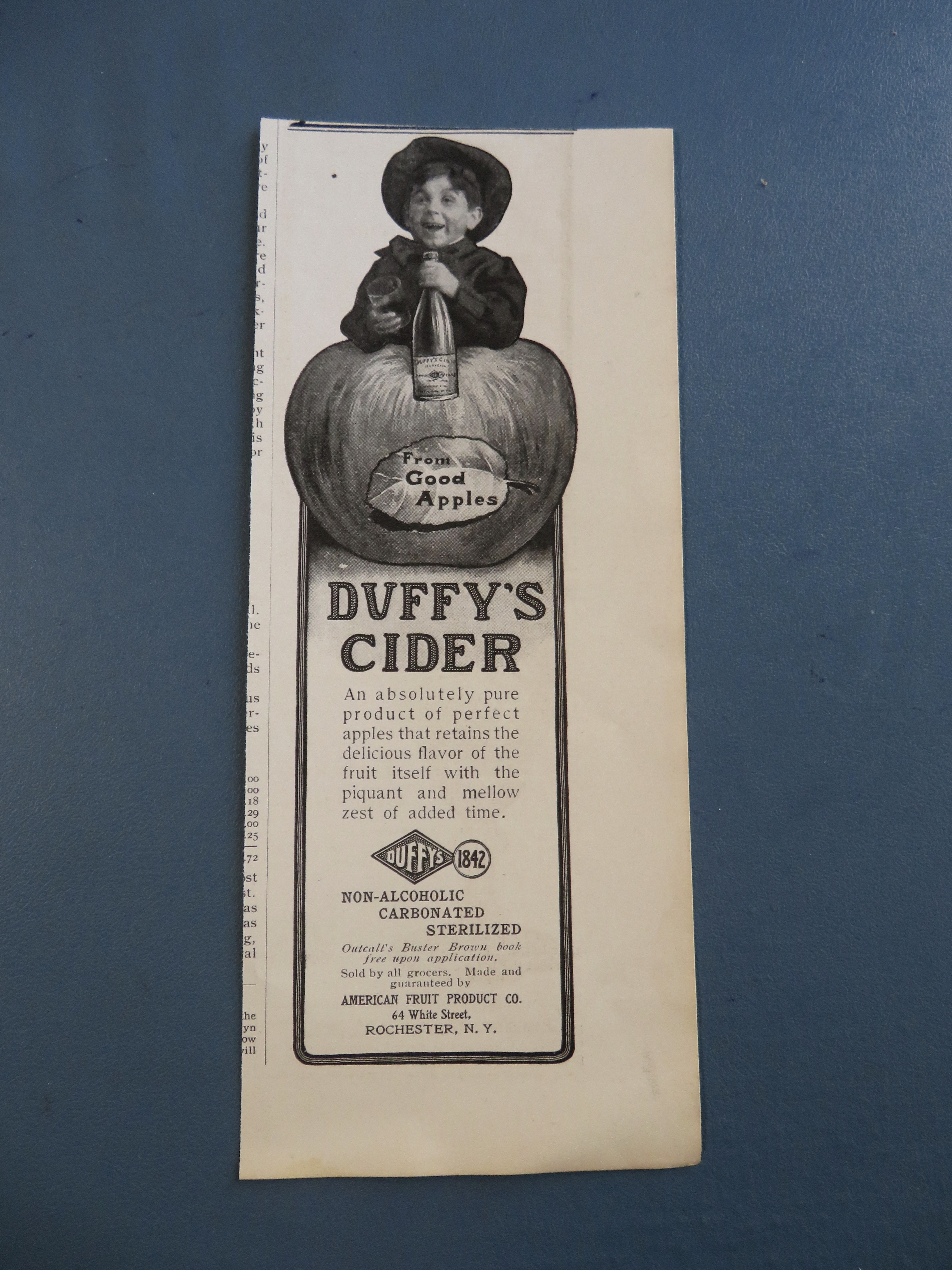 1904 Duffy's Cider with Boy Behind An Apple
