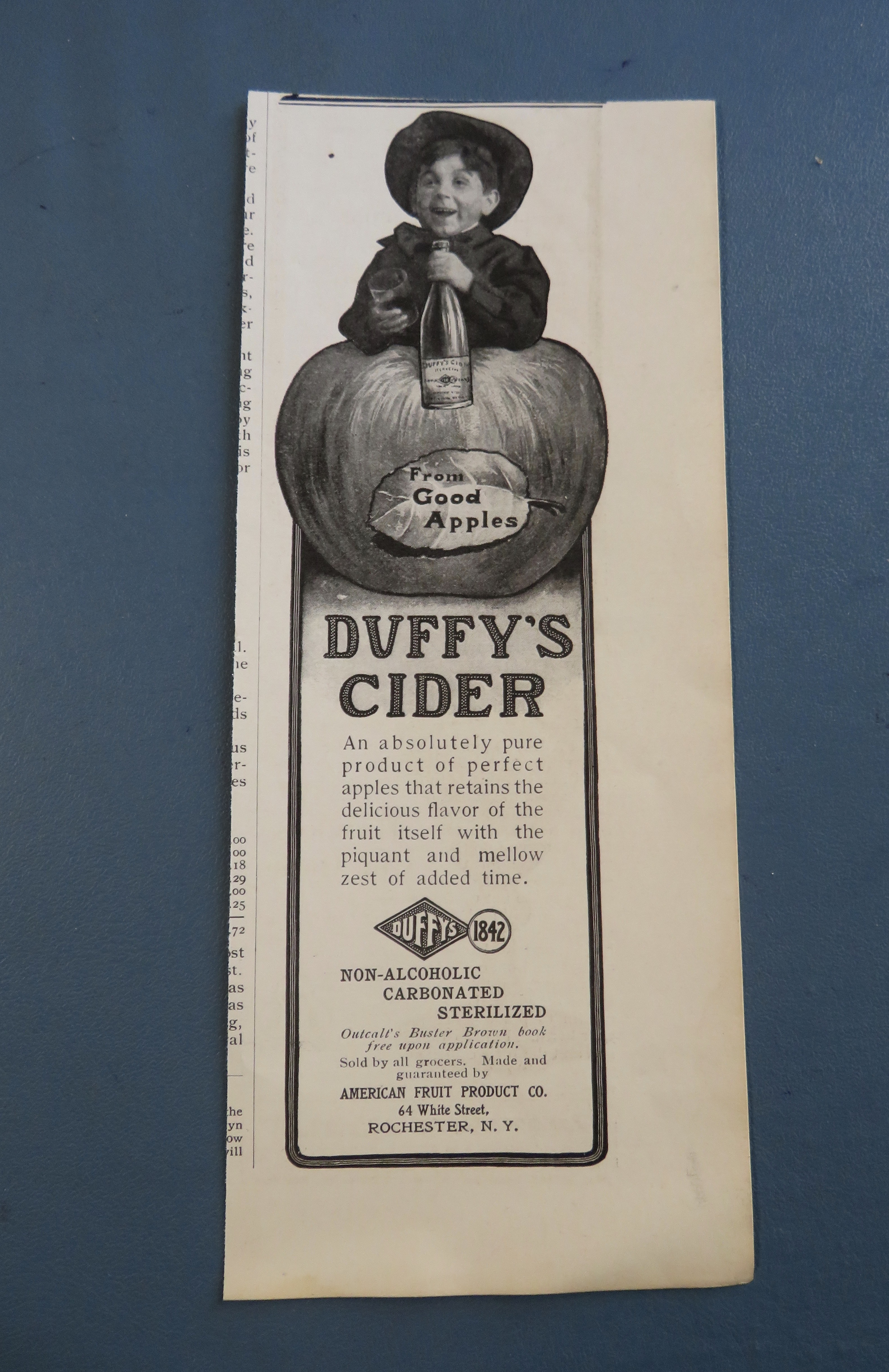 1904 Duffy's Cider with Boy Behind An Apple