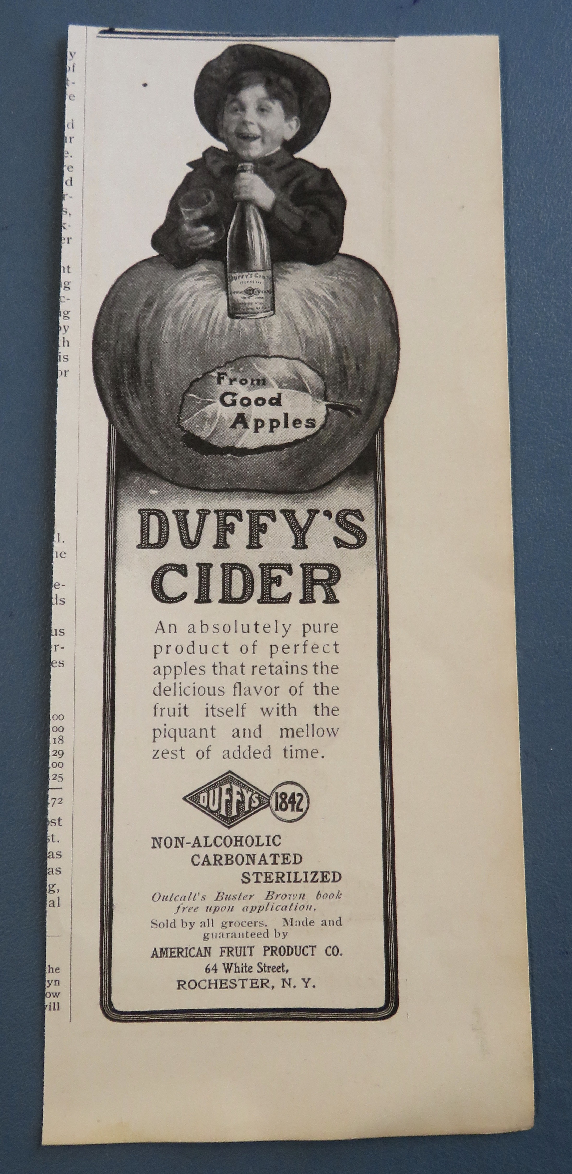 1904 Duffy's Cider with Boy Behind An Apple