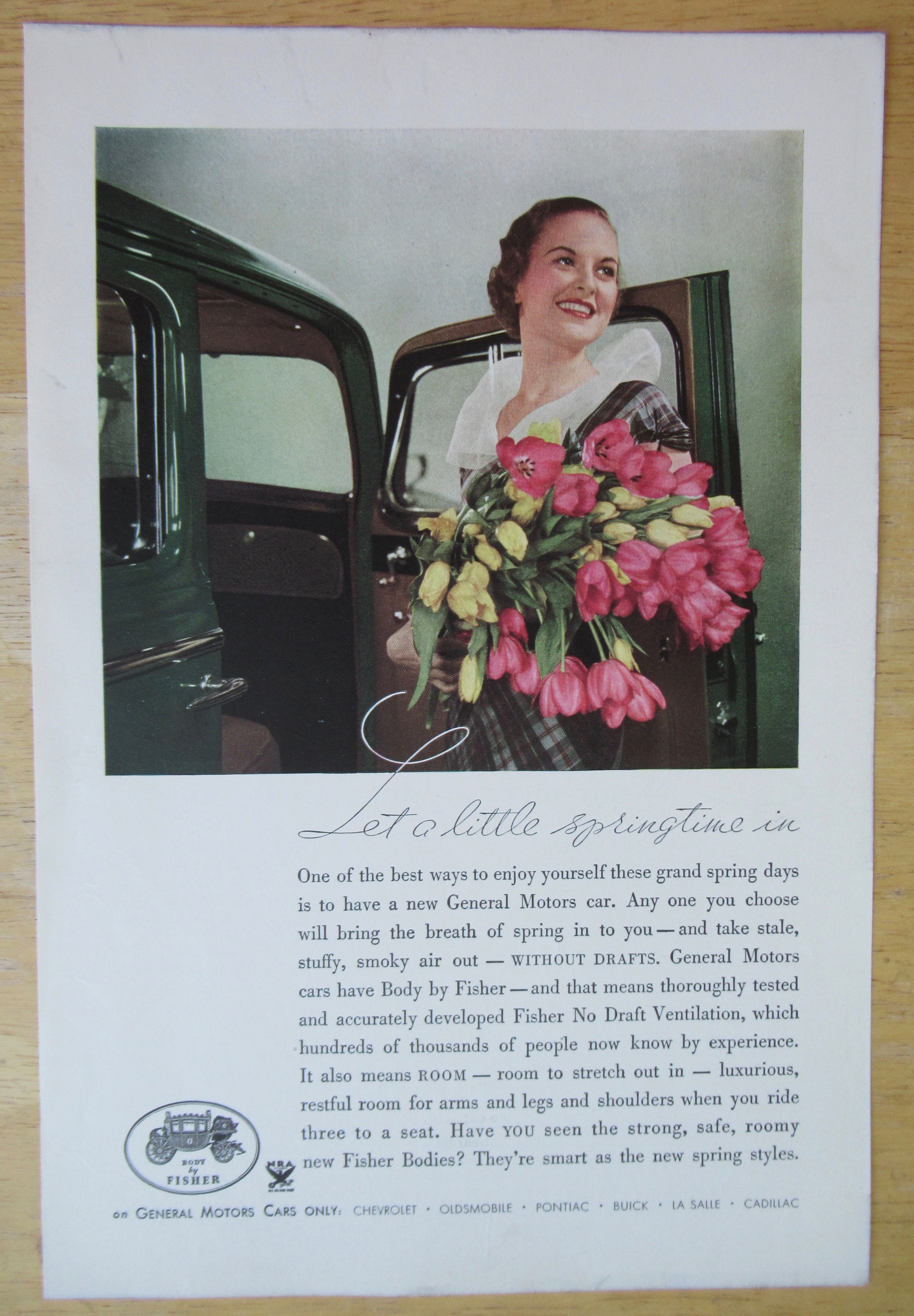 1934 Body By Fisher with Woman Holding Flowers