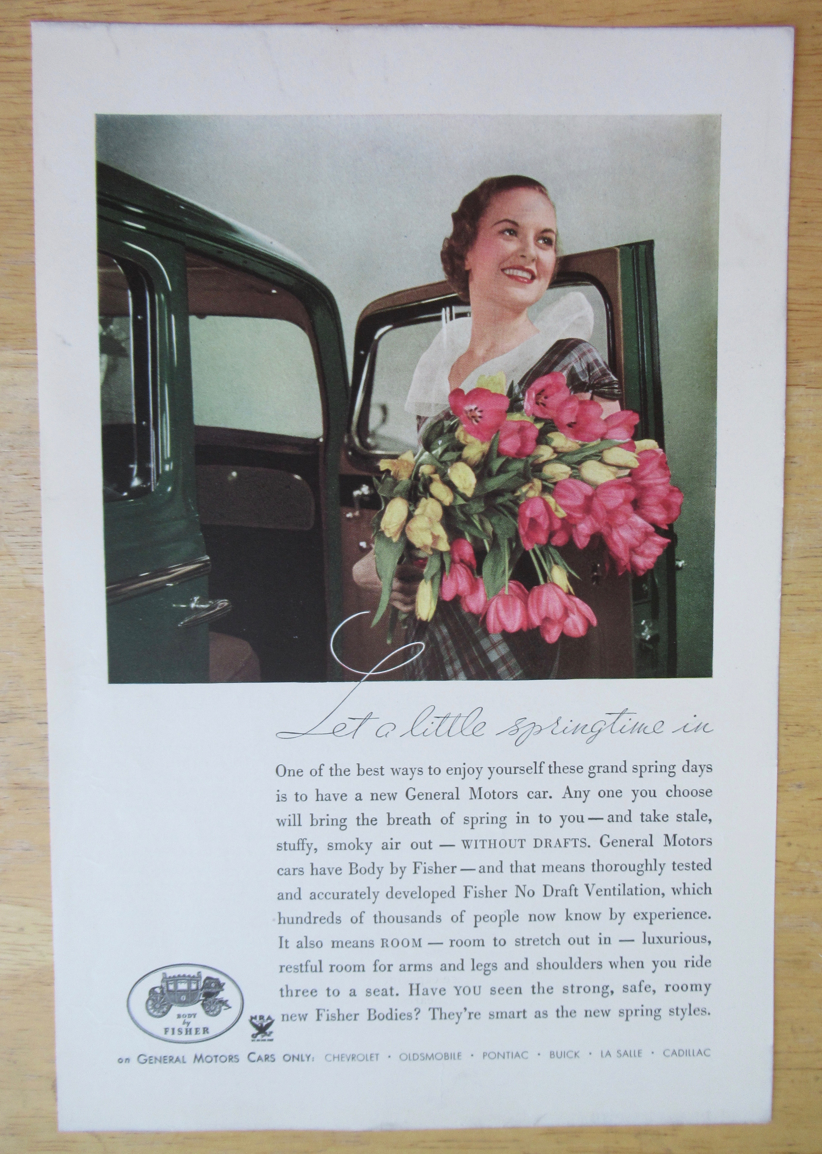 1934 Body By Fisher with Woman Holding Flowers
