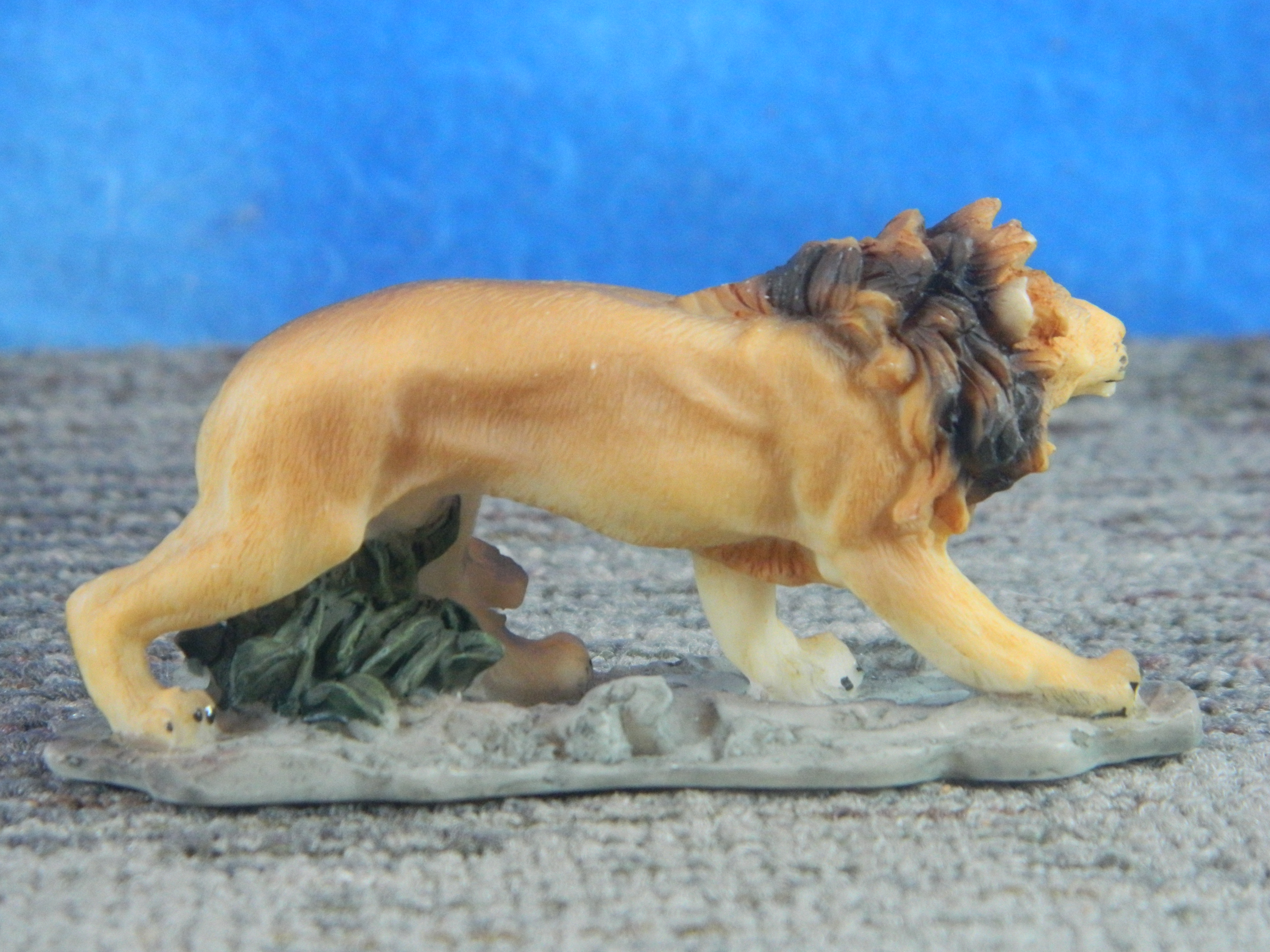 Handsome Unmarked Resin Prowling Lion