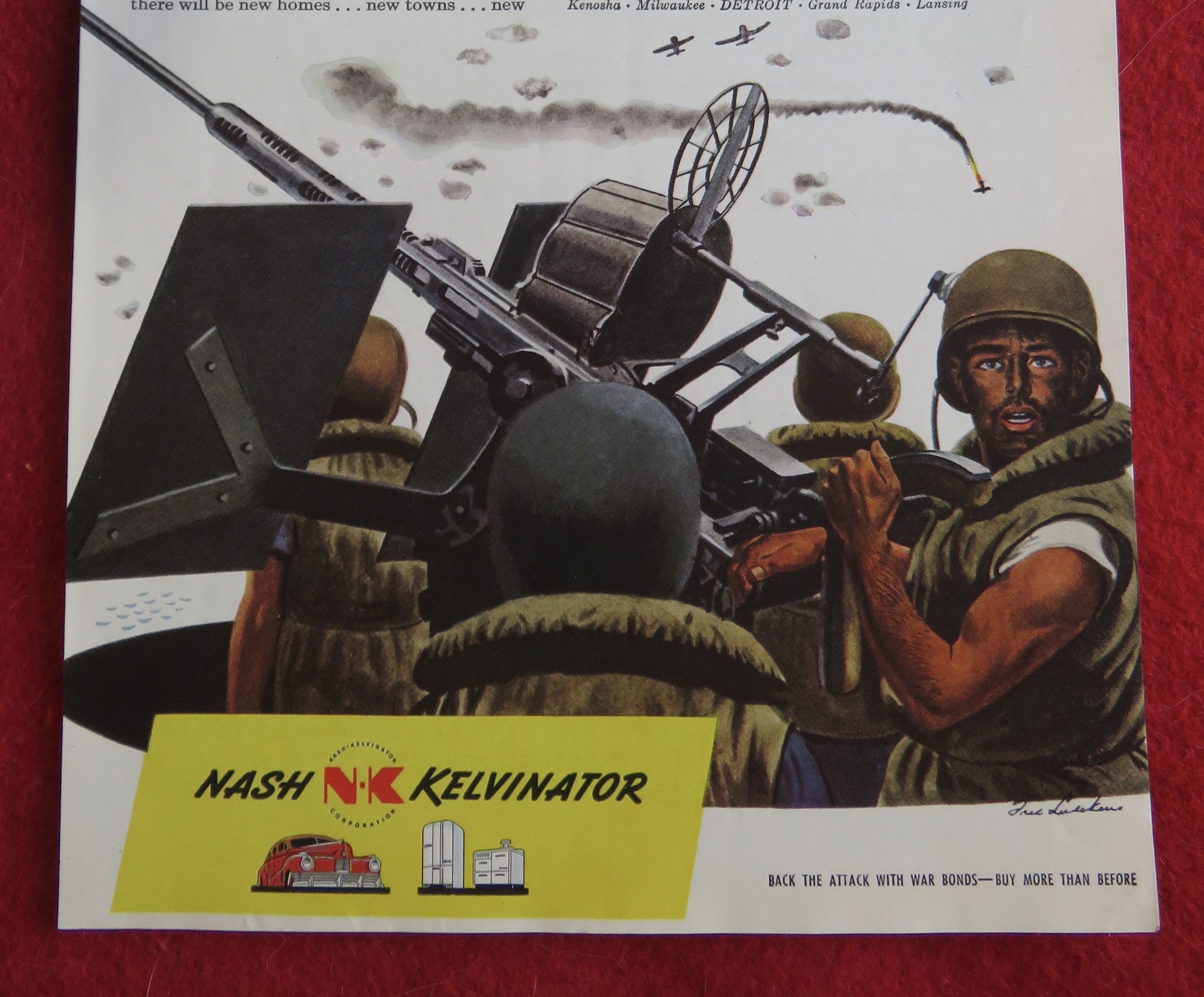 1944 Kelvinator with Soldiers Shooting A Big Gun