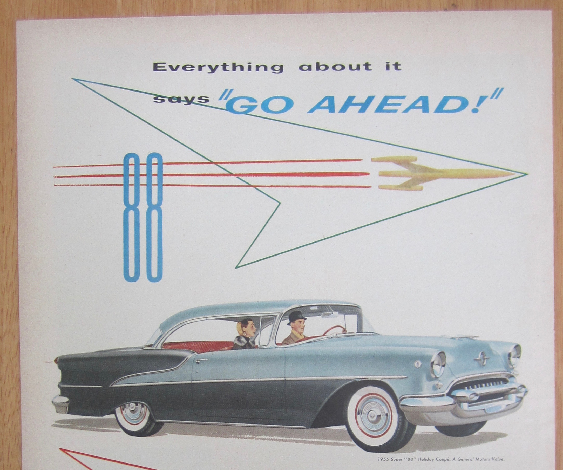 1955 Oldsmobile with Super 88 Holiday Coupe