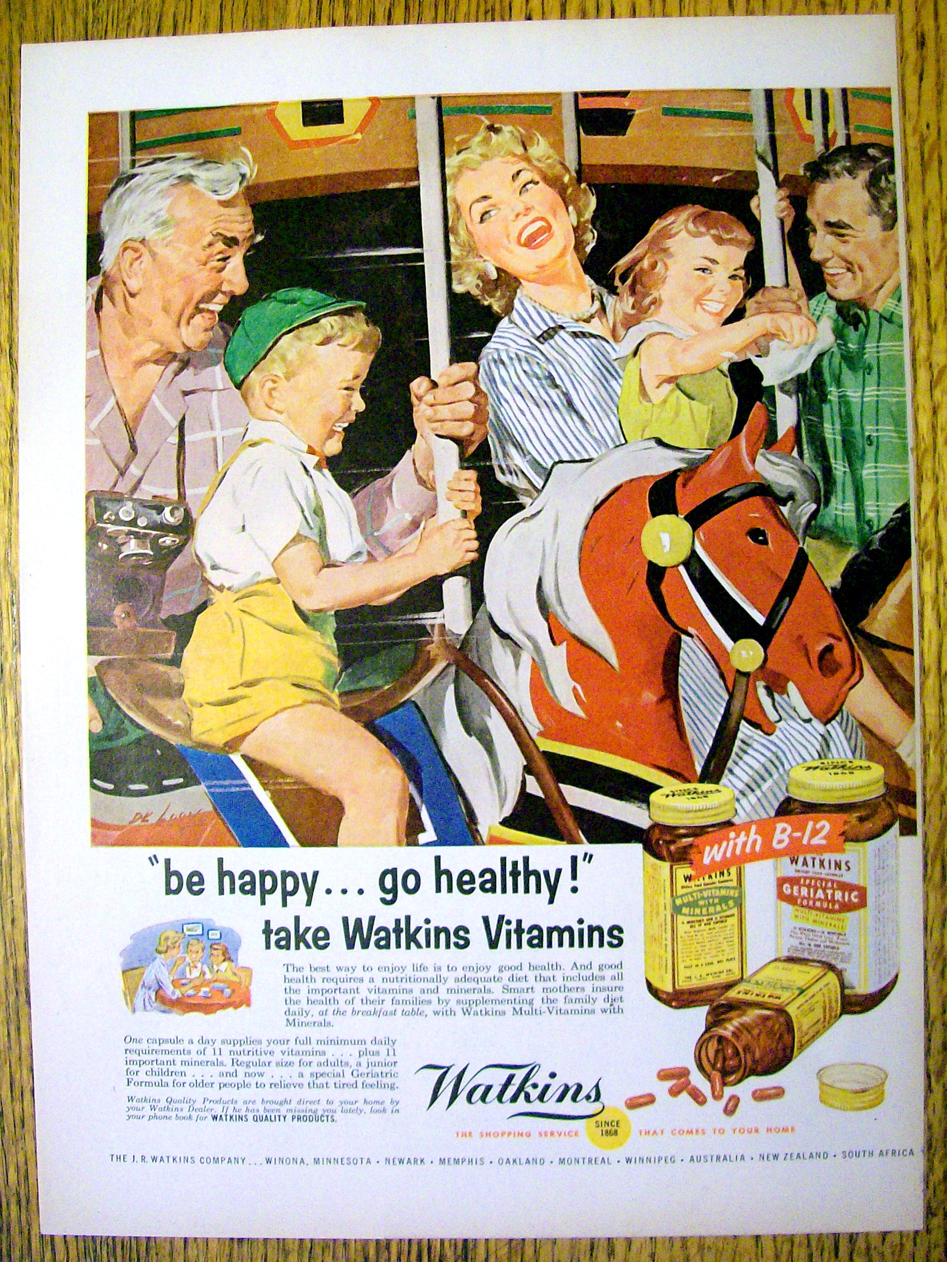 1957 Watkins Vitamins with Family On Merry Go Round