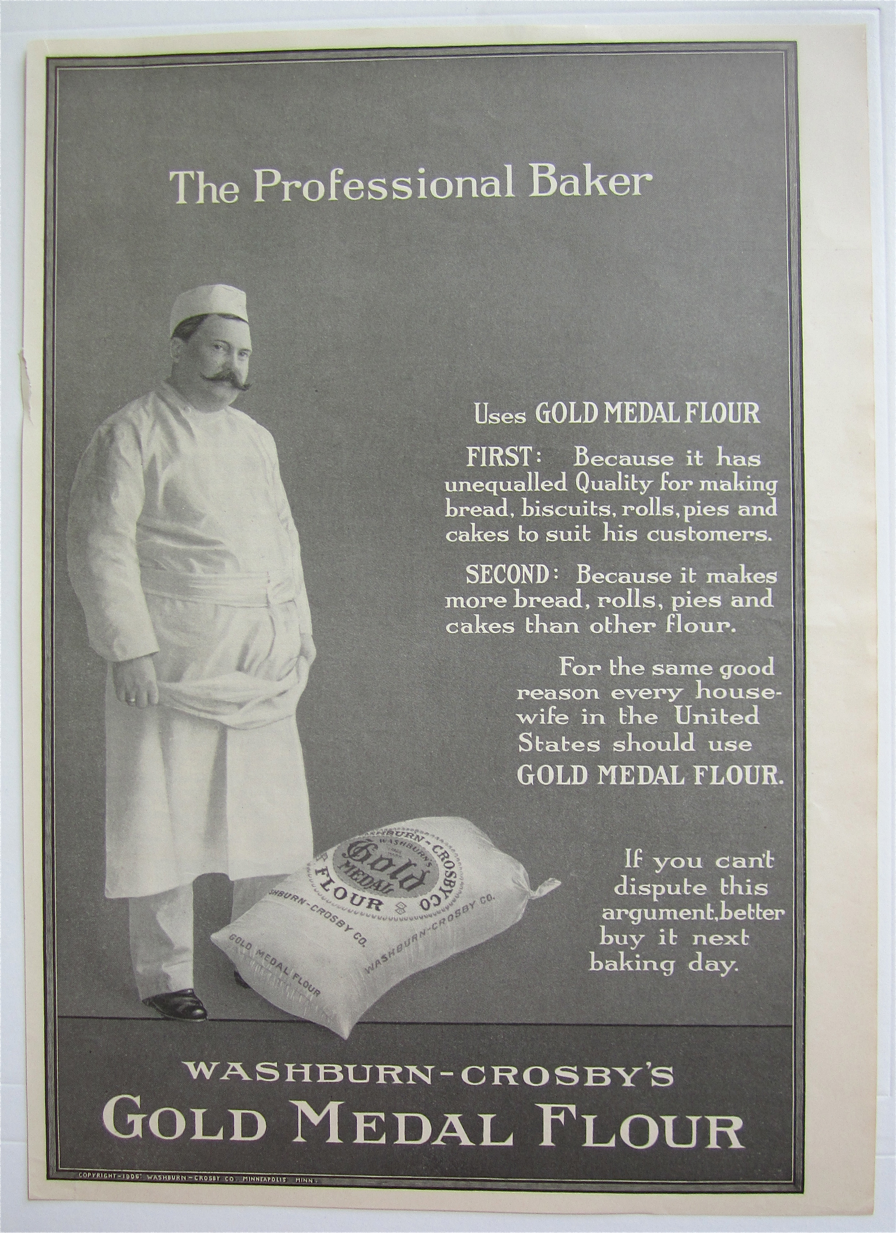 1907 Gold Medal Flour with Man Standing By Bag Of Flour
