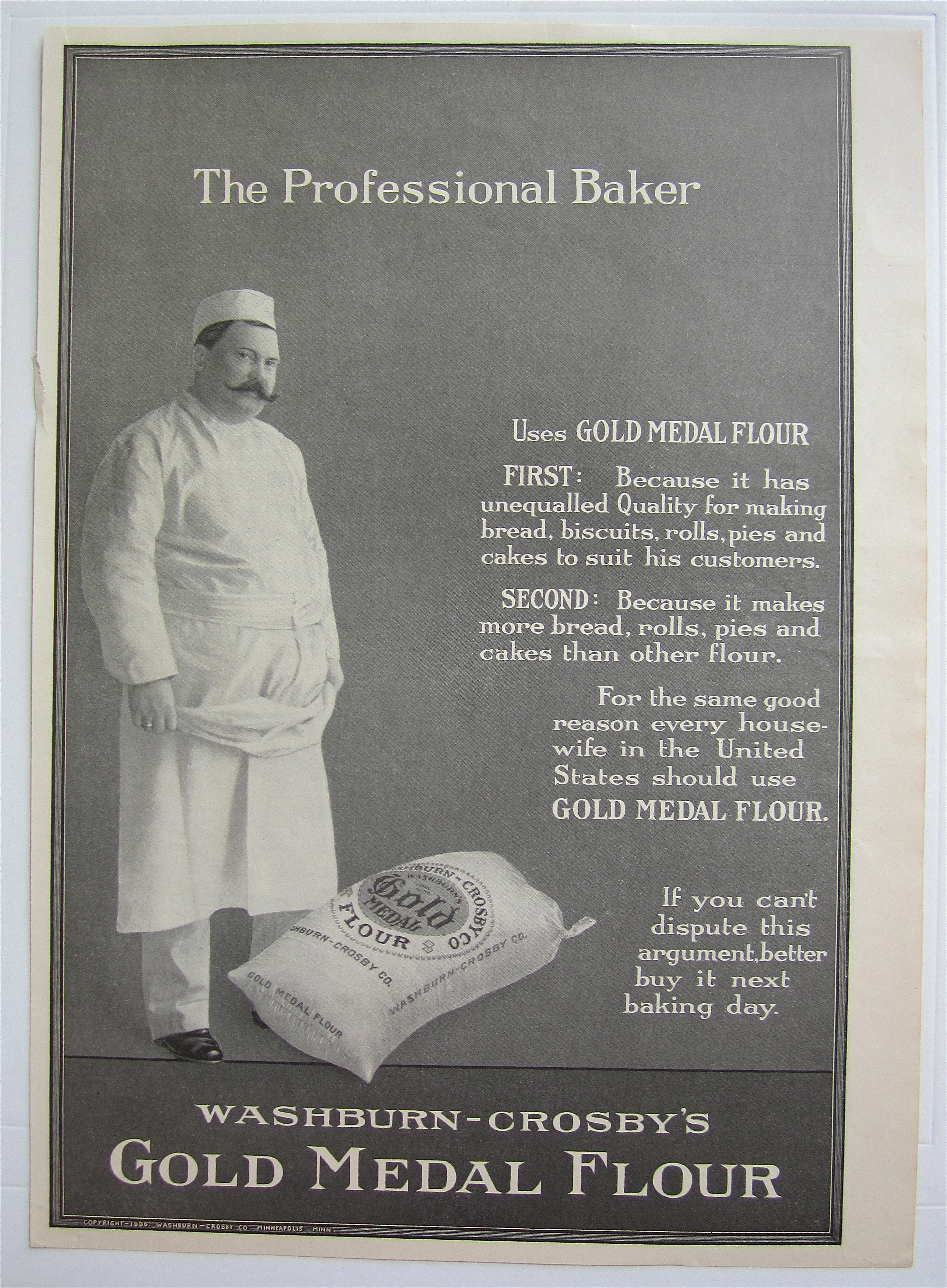 1907 Gold Medal Flour with Man Standing By Bag Of Flour
