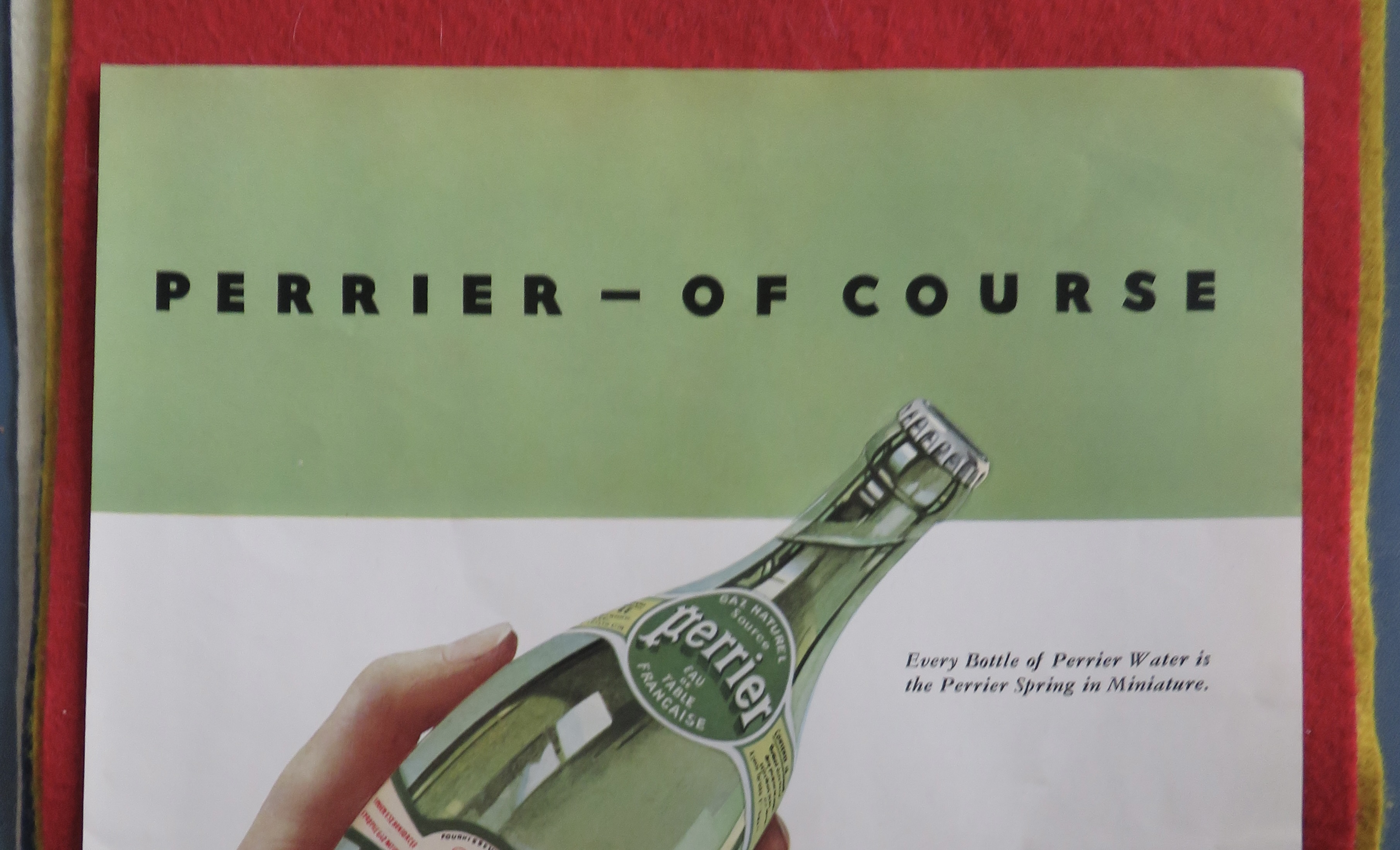 1934 Perrier Bottle Water with Hand Holding Bottle