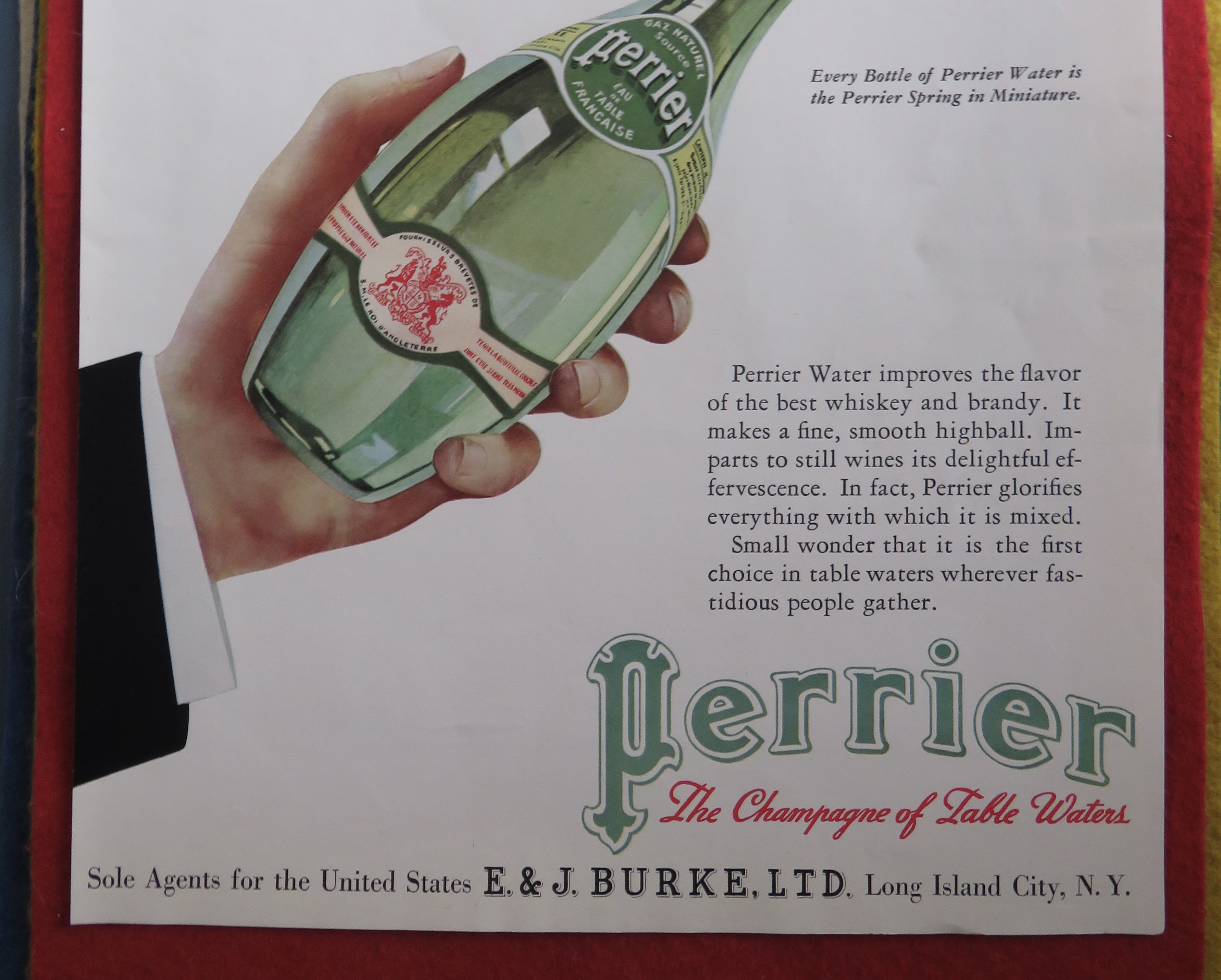 1934 Perrier Bottle Water with Hand Holding Bottle