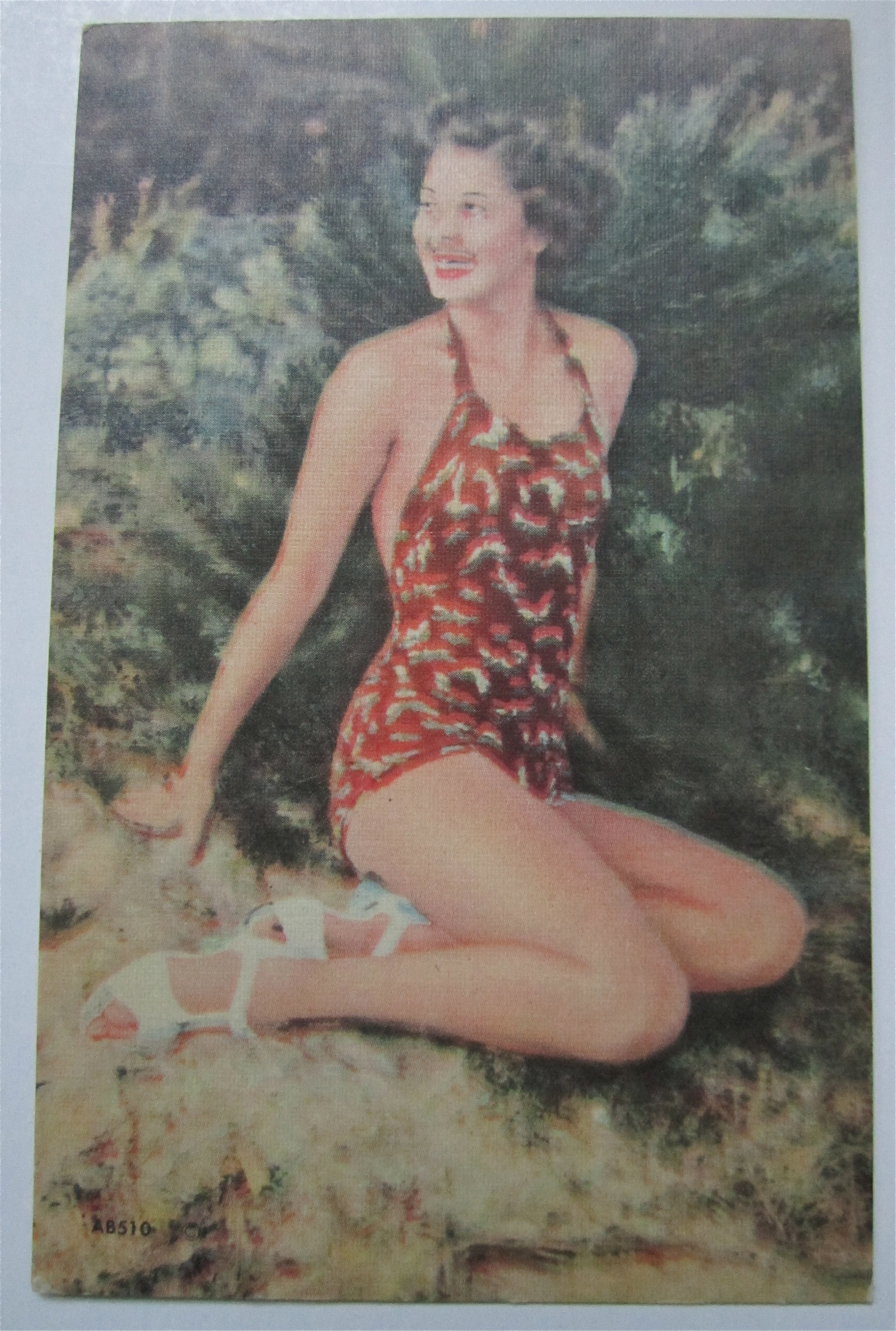 Woman Sitting On Sand Smiling Postcard