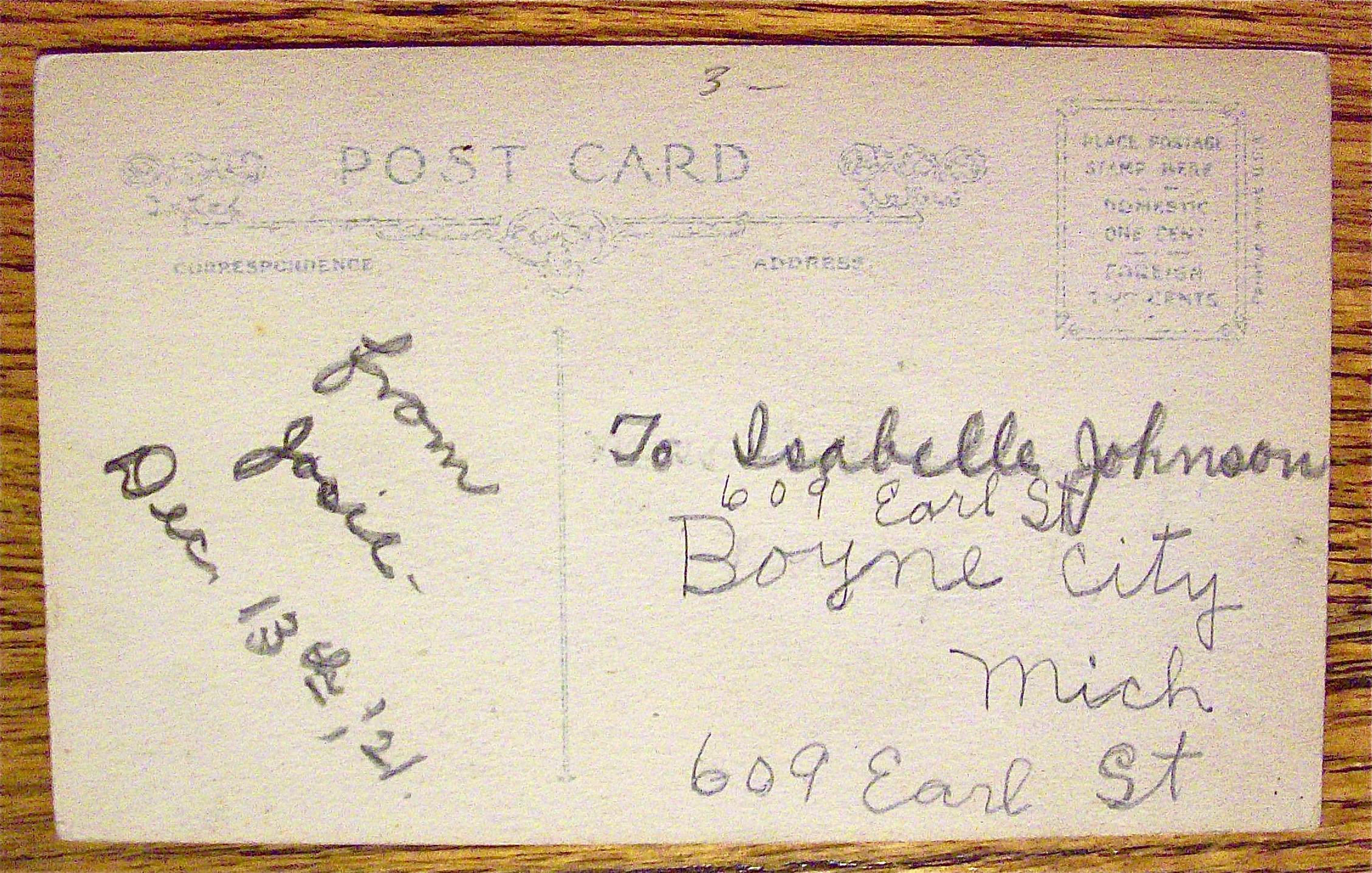 A Cat Smiling With Their Paw By Their Face Postcard