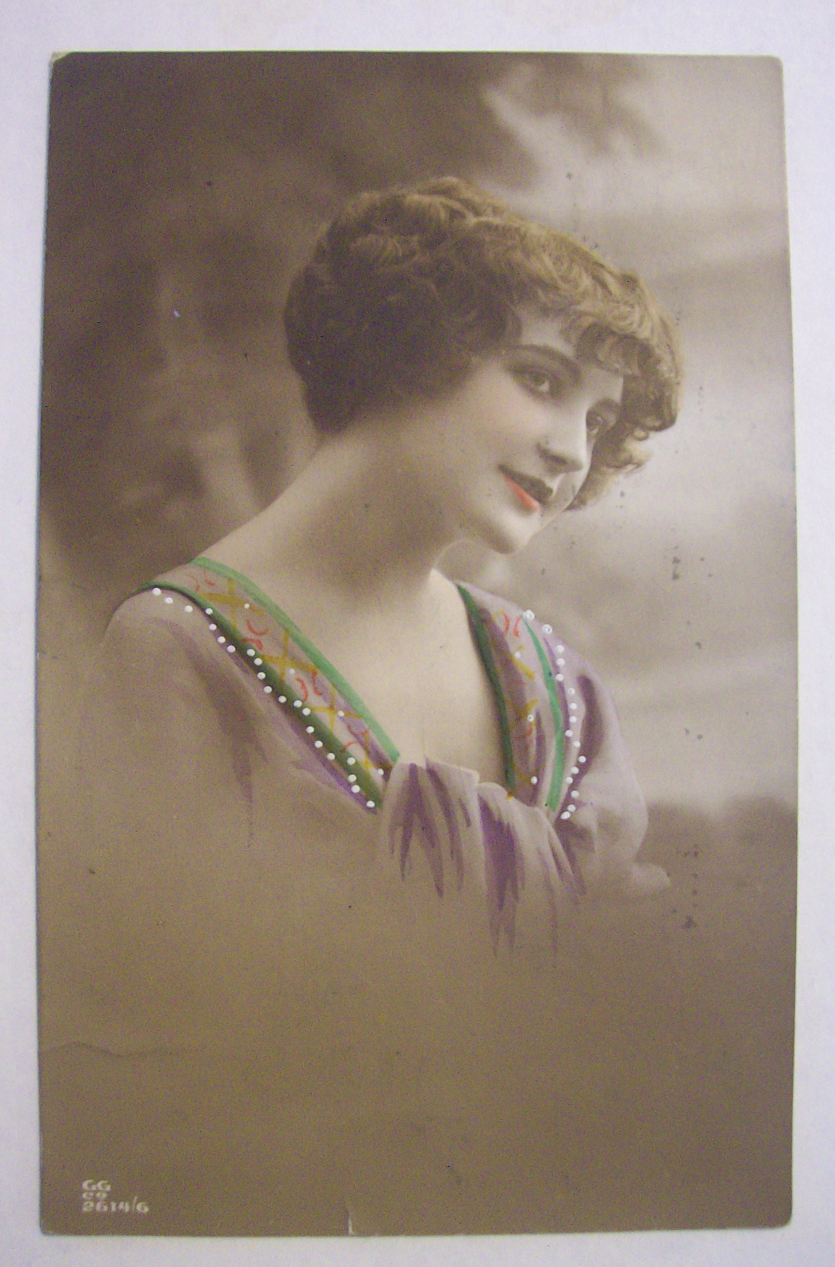 Woman Sitting And Smiling Postcard