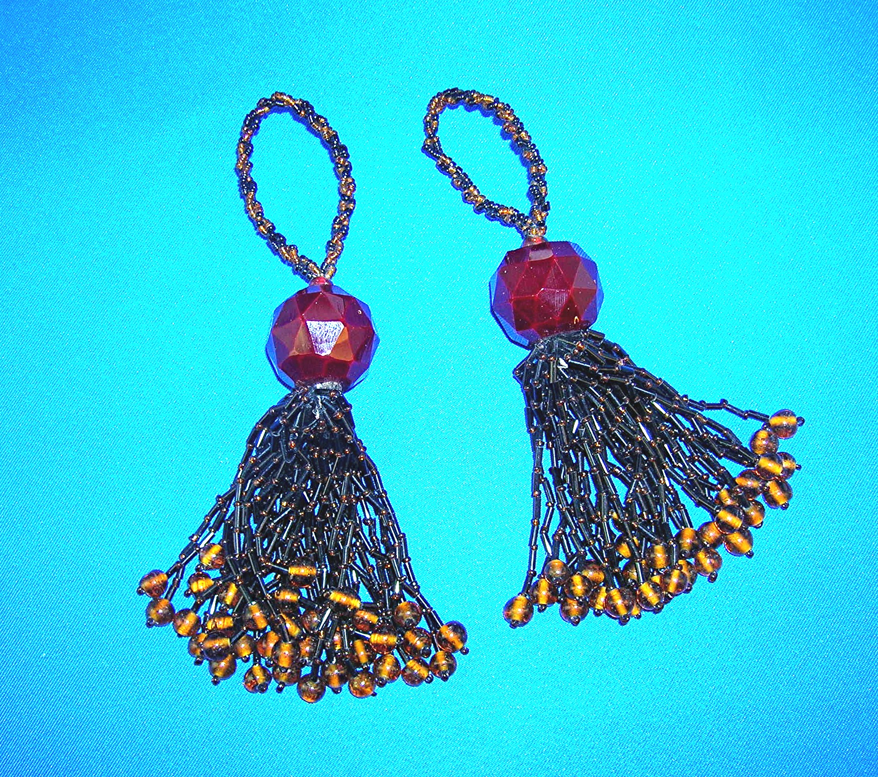 Pair Of Glass Black & Amber Bead Tassles