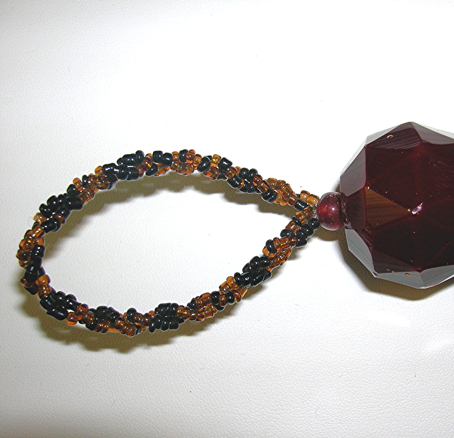 Pair Of Glass Black & Amber Bead Tassles