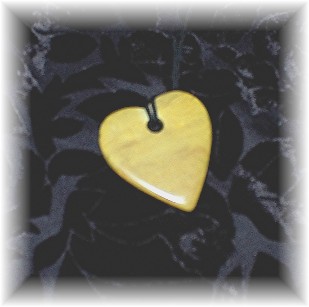 Bakelite Heart Pendant Gold 2 1/4 inches