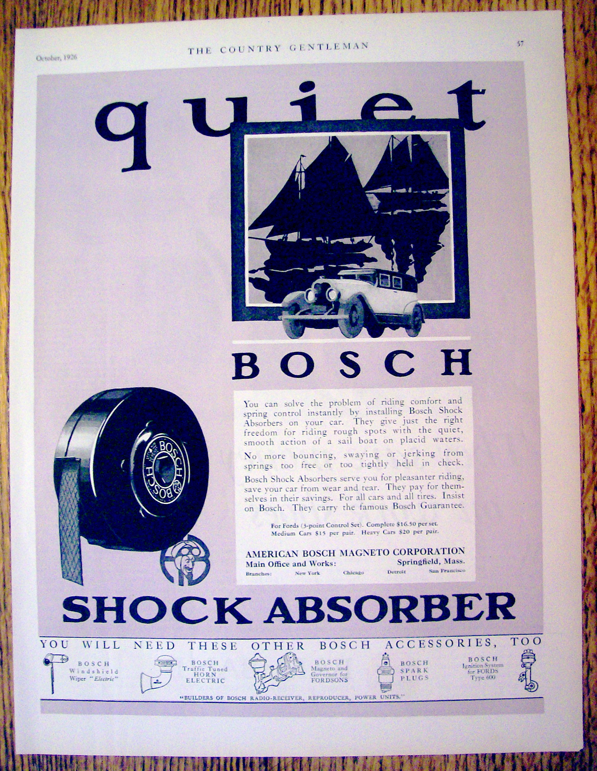 1926 Bosch Shock Absorbers with Old Fashioned Car