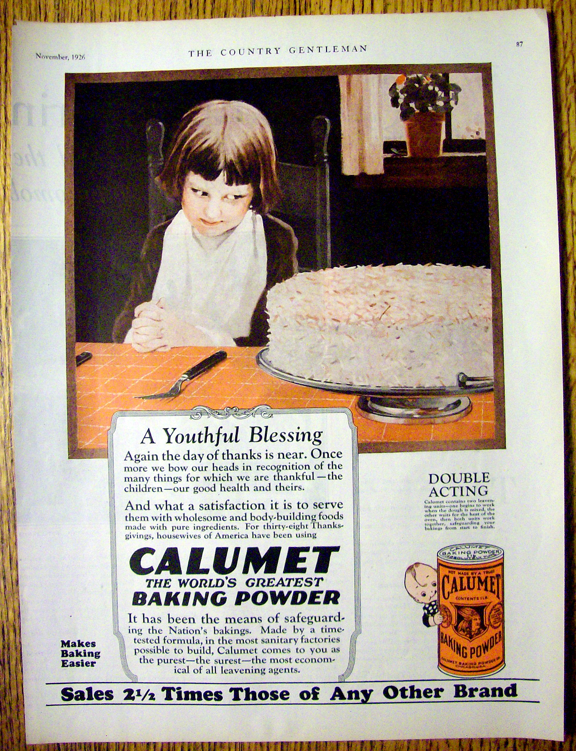 1926 Calumet Baking Powder with Boy Looking At Cake