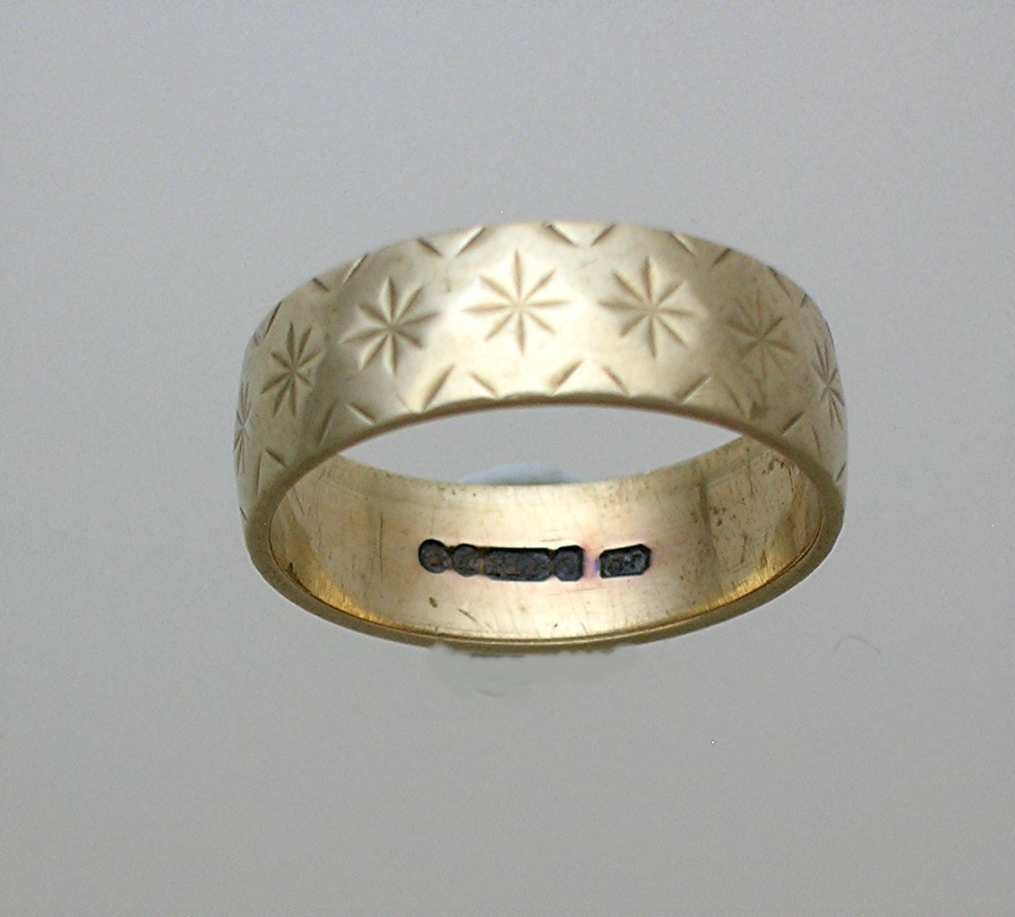 Hallmarked European Yellow Gold Wedding Band . . . . .