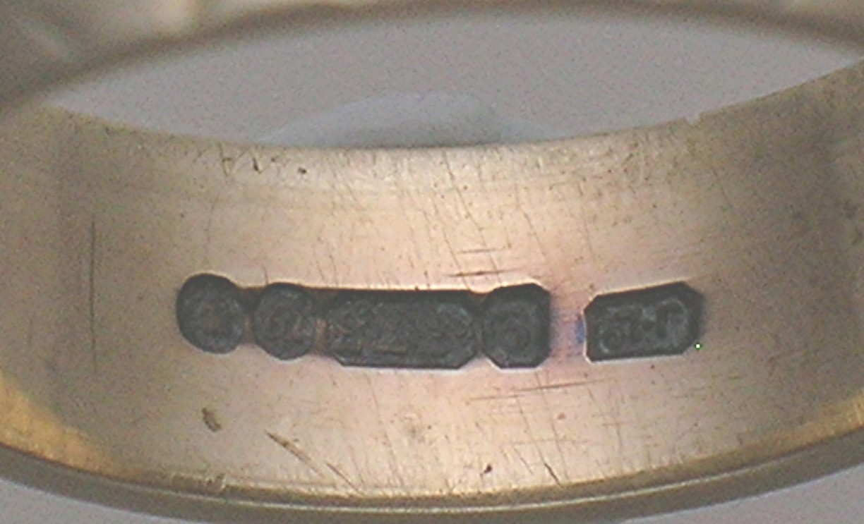 Hallmarked European Yellow Gold Wedding Band . . . . .