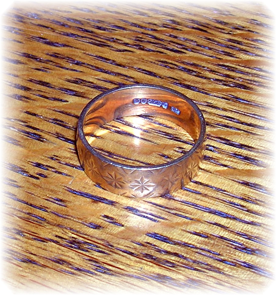 Hallmarked European Yellow Gold Wedding Band . . . . .