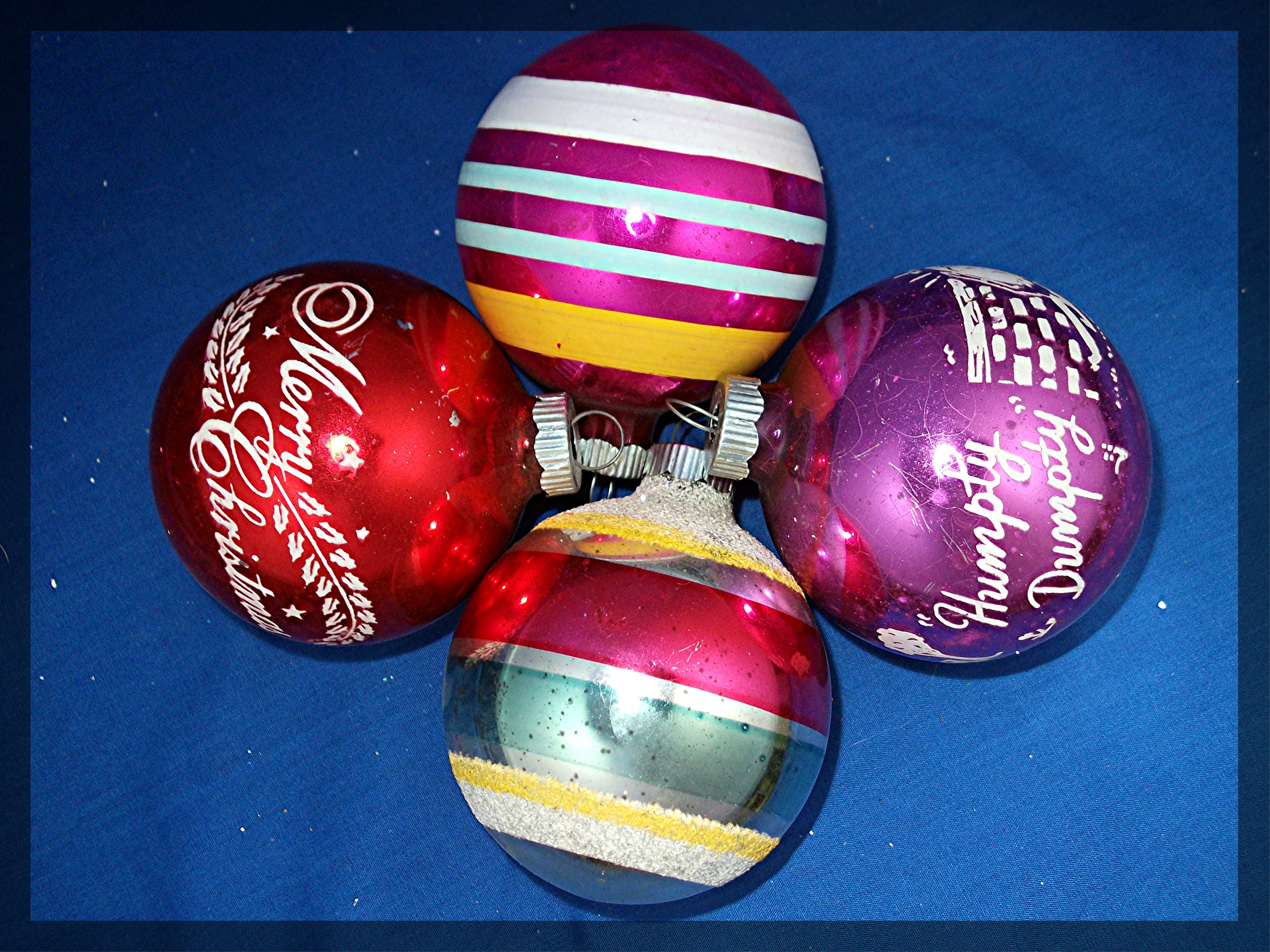 Lot of four (4) glass Christmas ornaments  . . . . .
