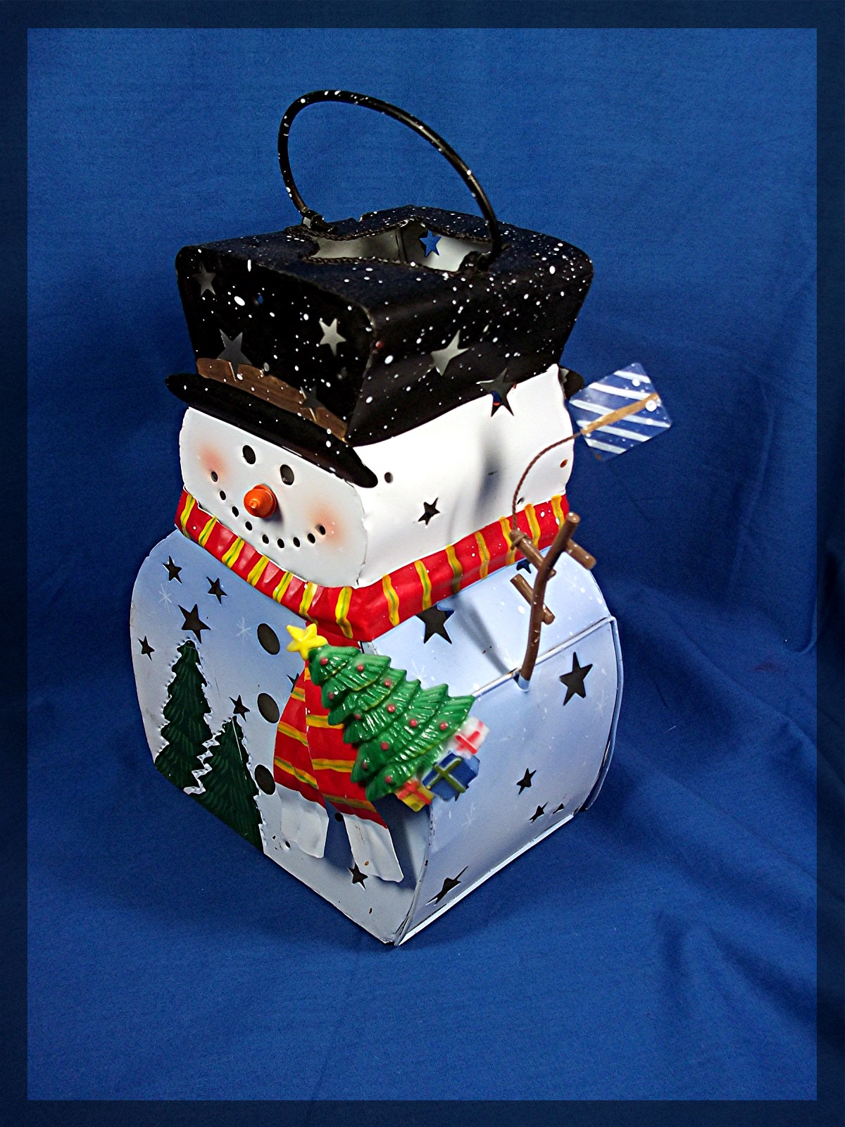 Snowman Luminary, Metal with glitter. Holds a tea light