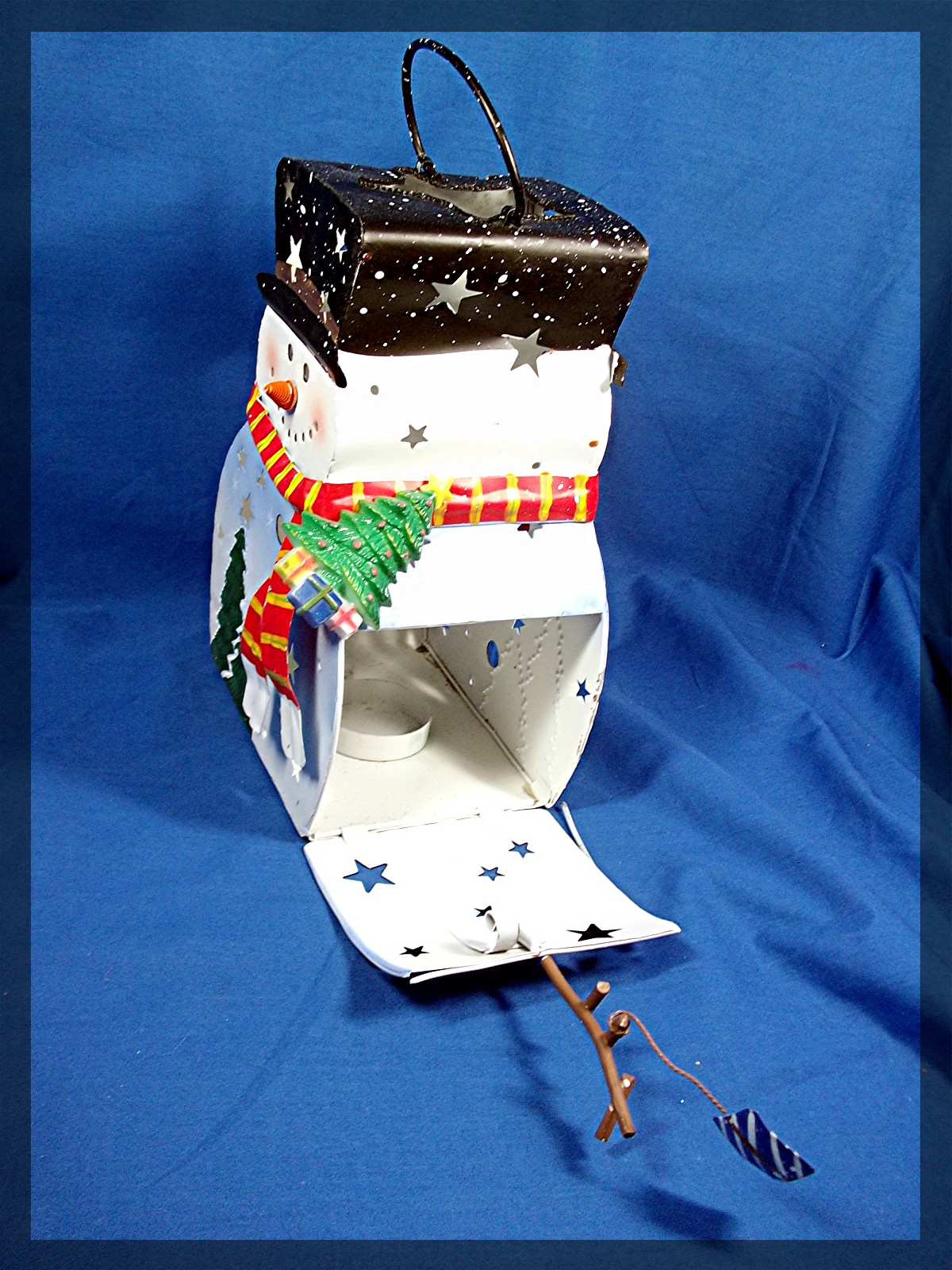 Snowman Luminary, Metal with glitter. Holds a tea light