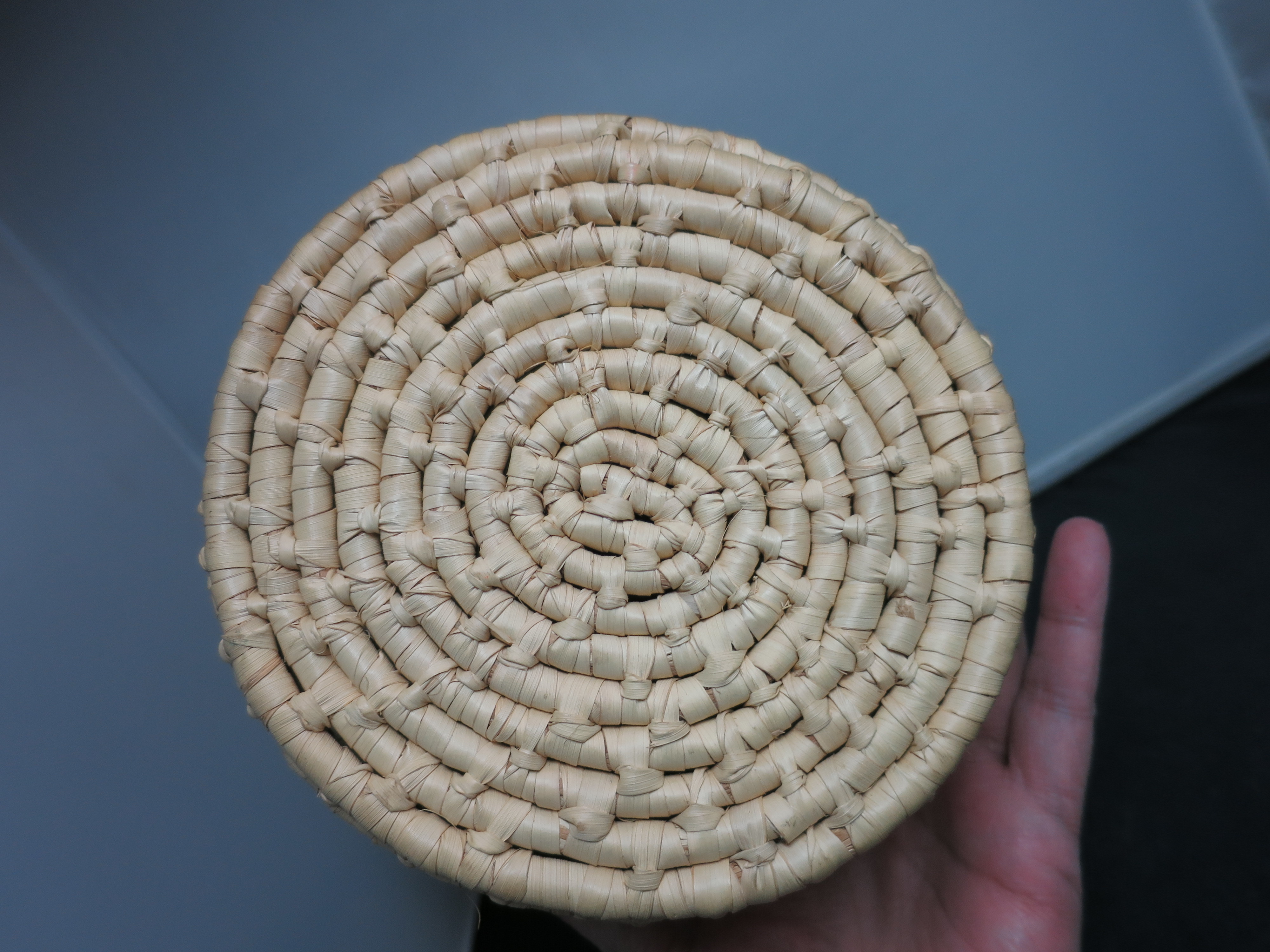 Coiled Basket with Lid and Handle Black African Doll on top