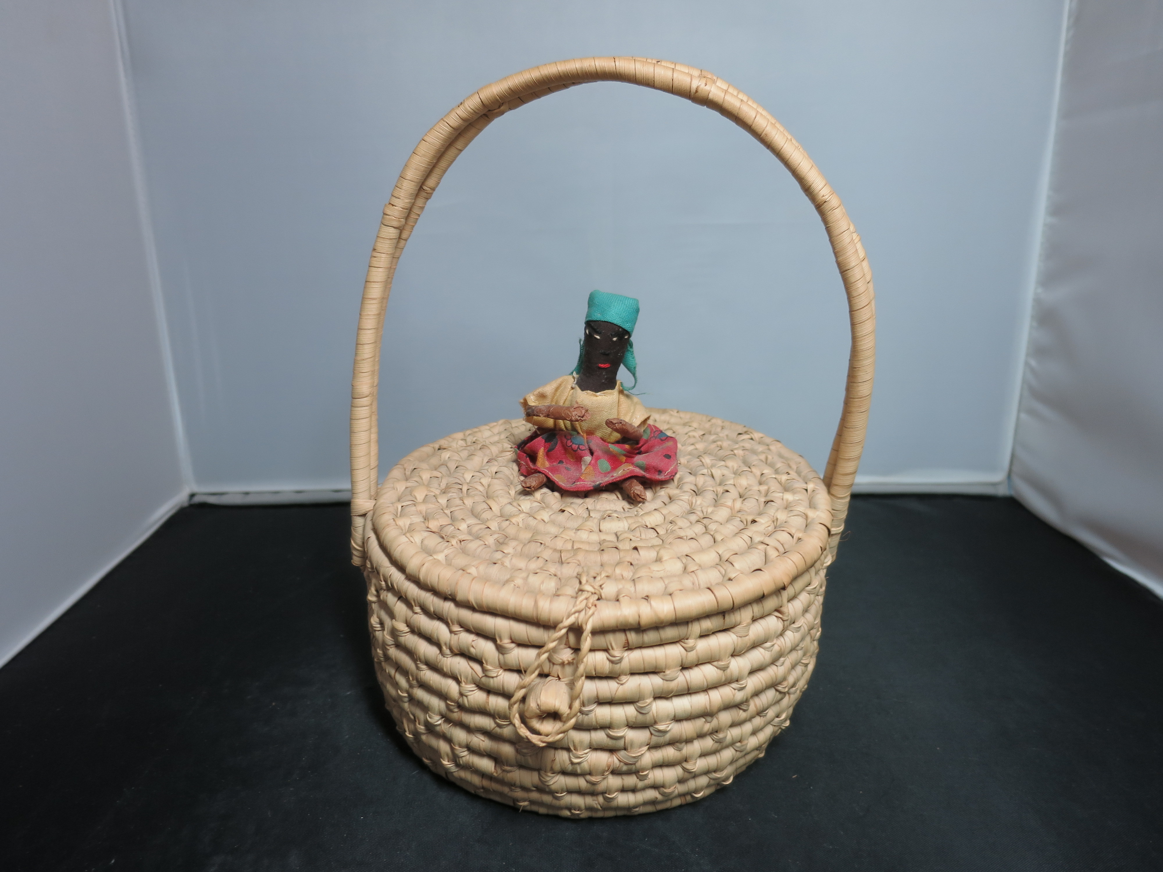 Coiled Basket with Lid and Handle Black African Doll on top