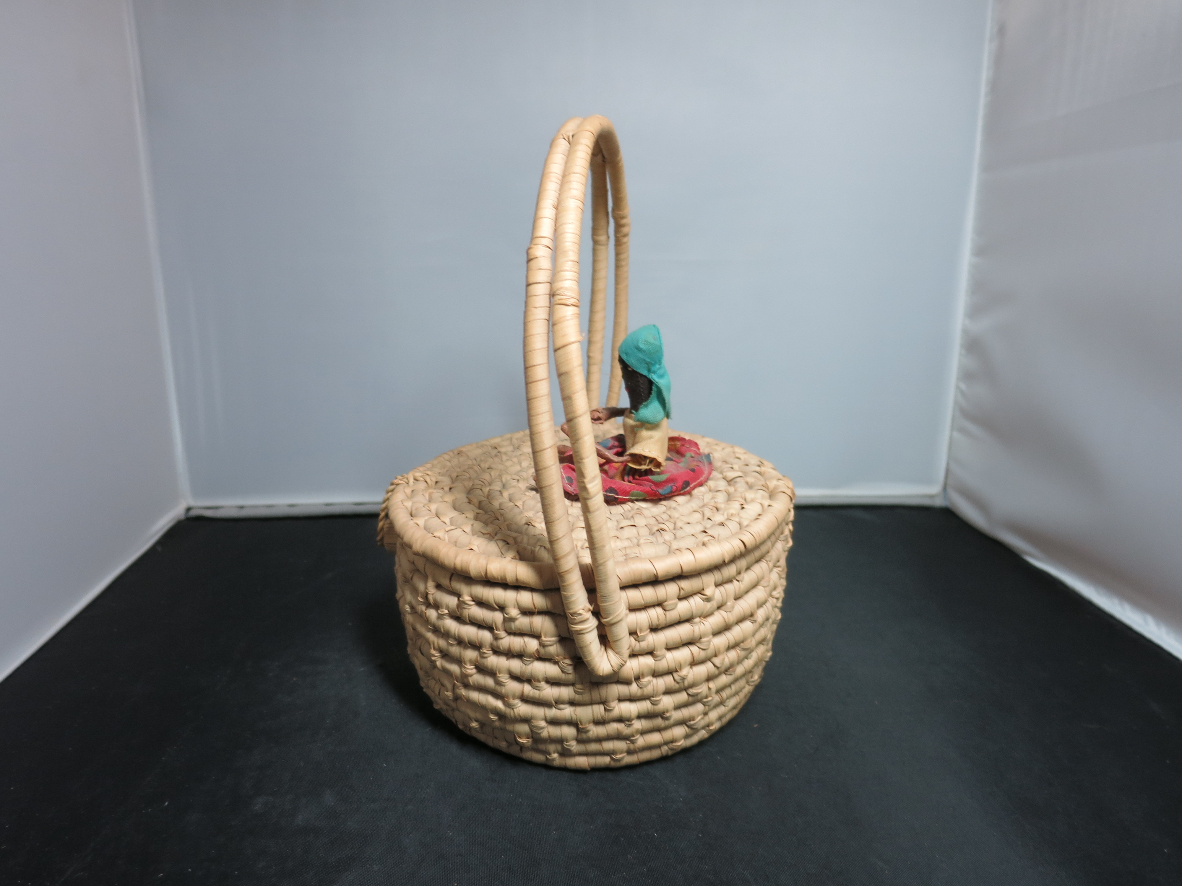 Coiled Basket with Lid and Handle Black African Doll on top