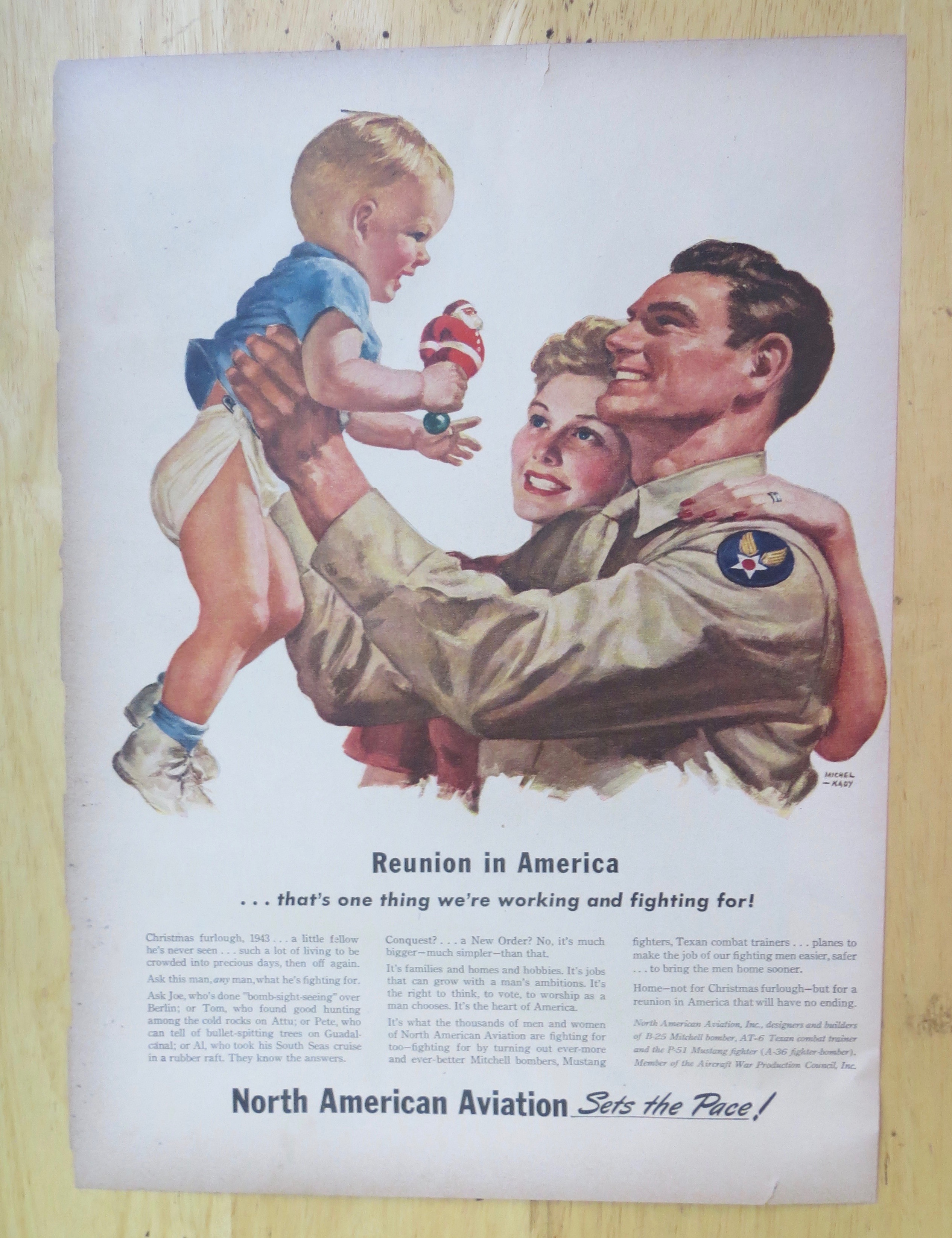 1943 North American Aviation with Soldier Holding Baby