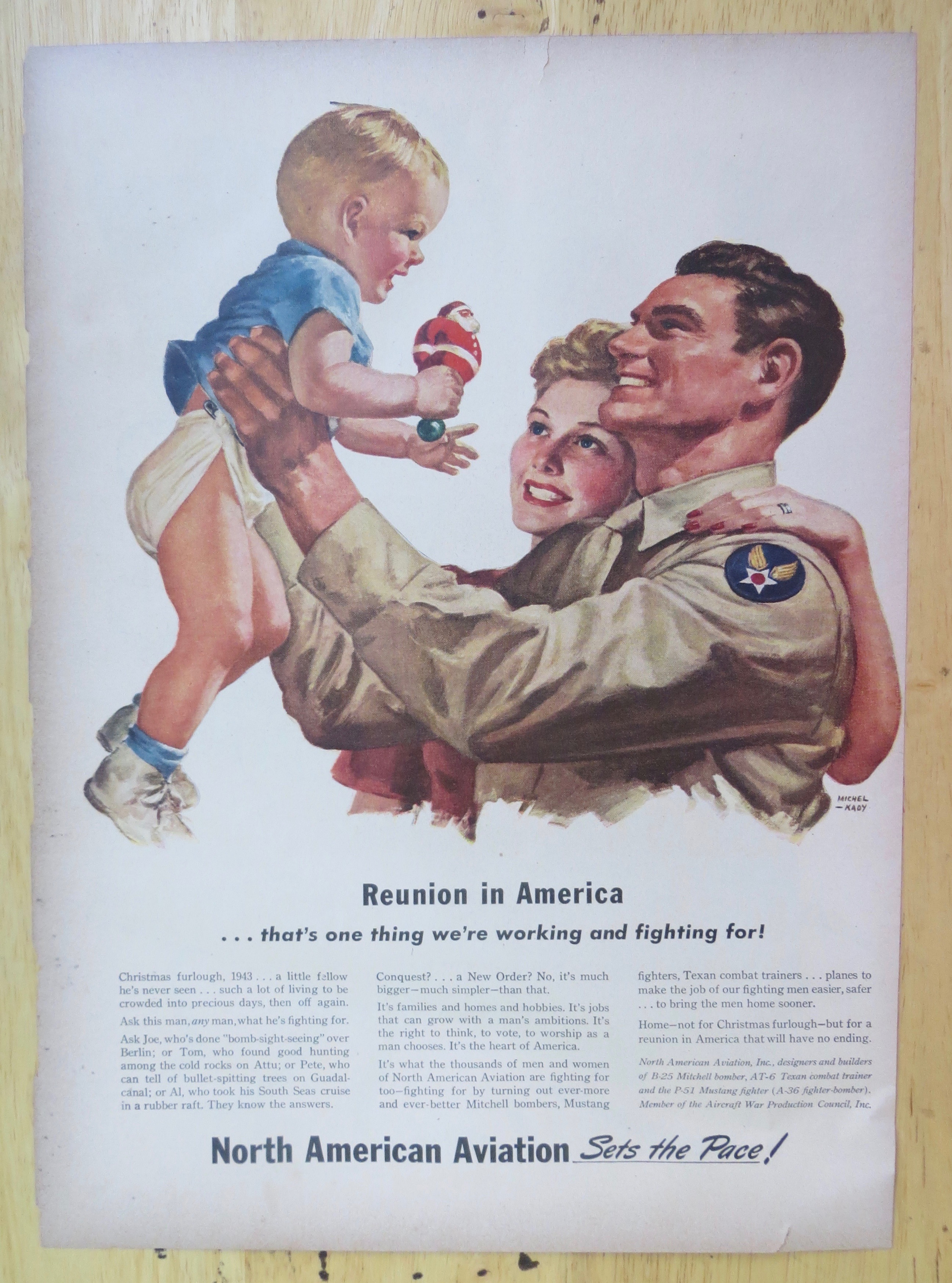 1943 North American Aviation with Soldier Holding Baby