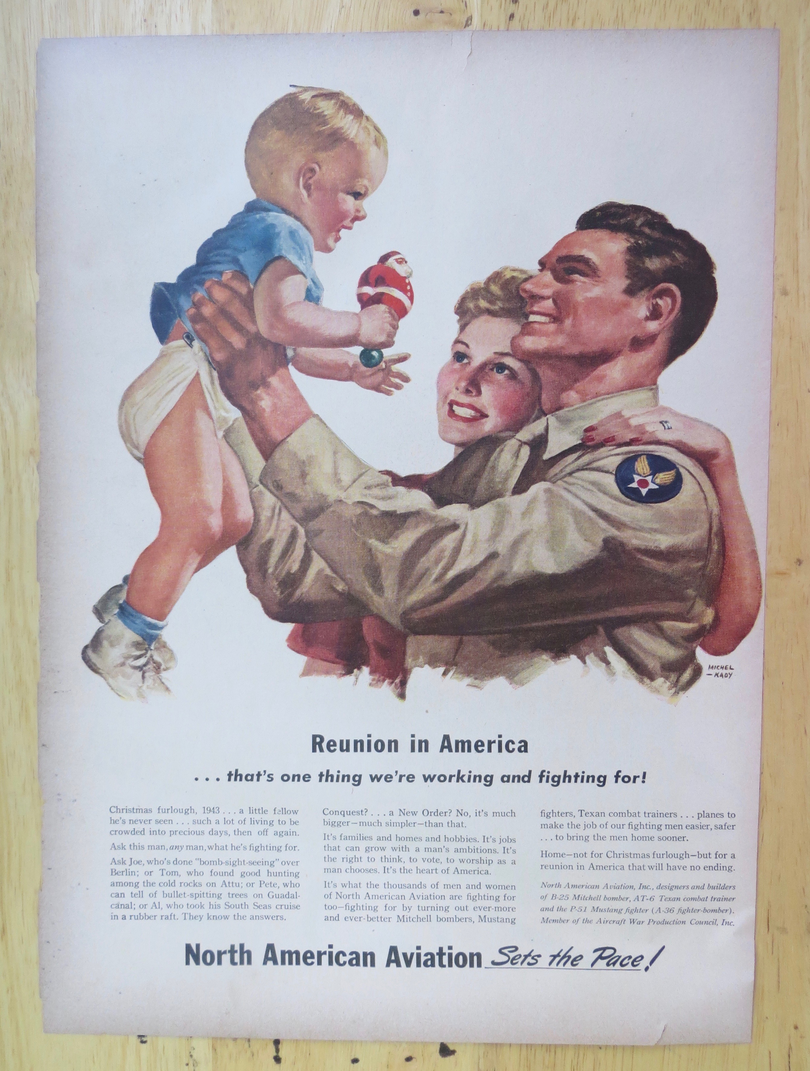 1943 North American Aviation with Soldier Holding Baby