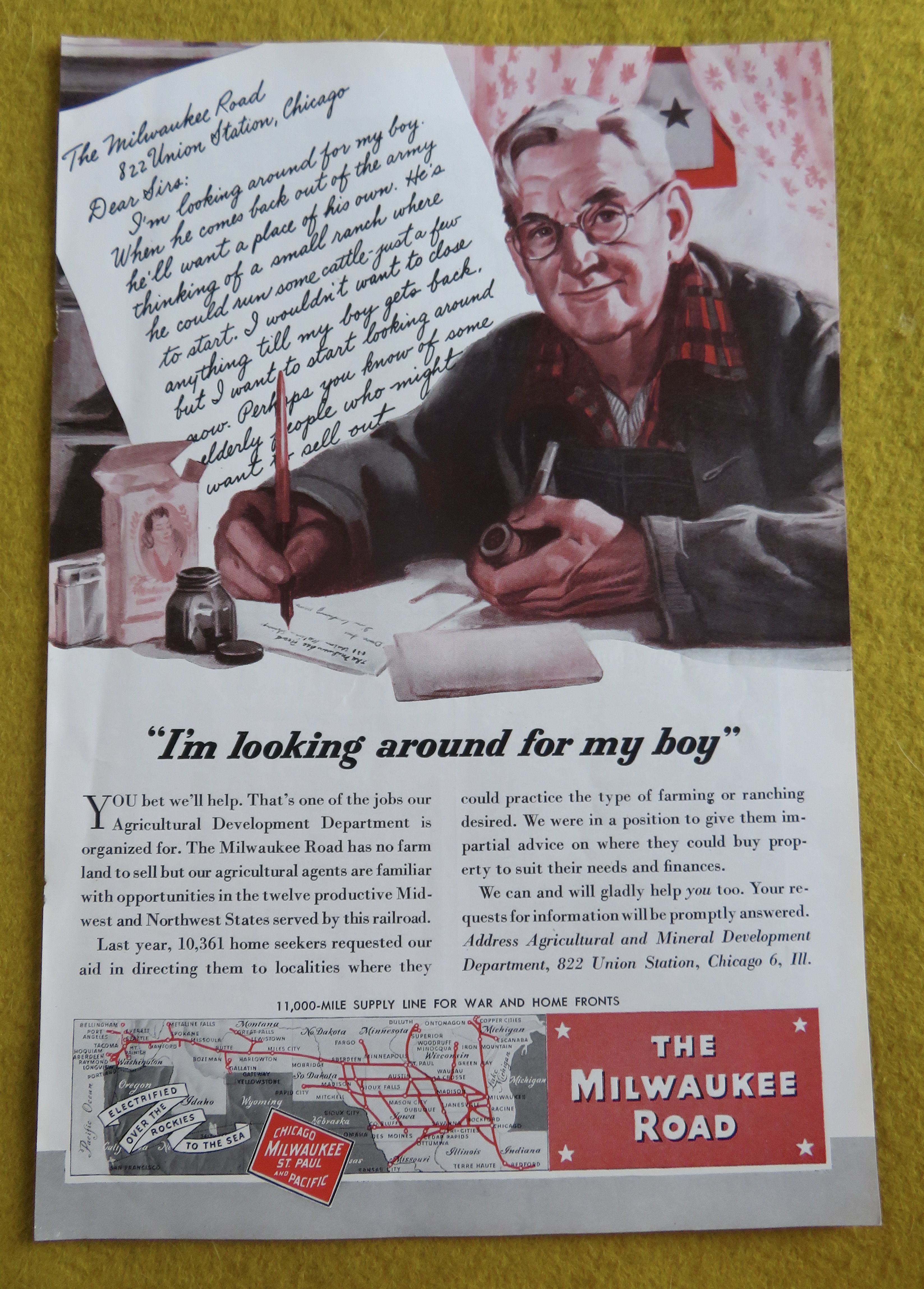 1945 Milwaukee Road with Man Writing Letter