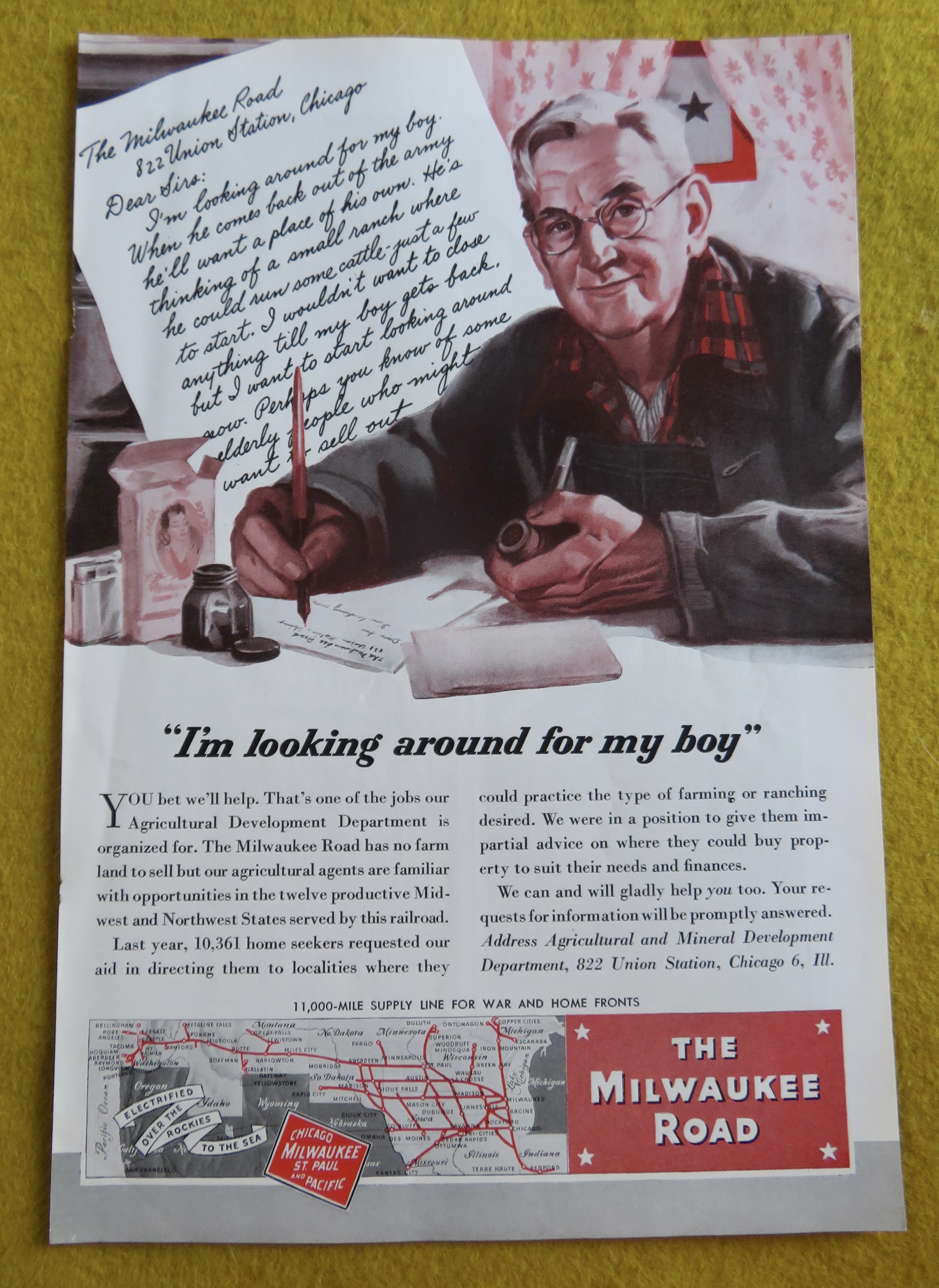 1945 Milwaukee Road with Man Writing Letter