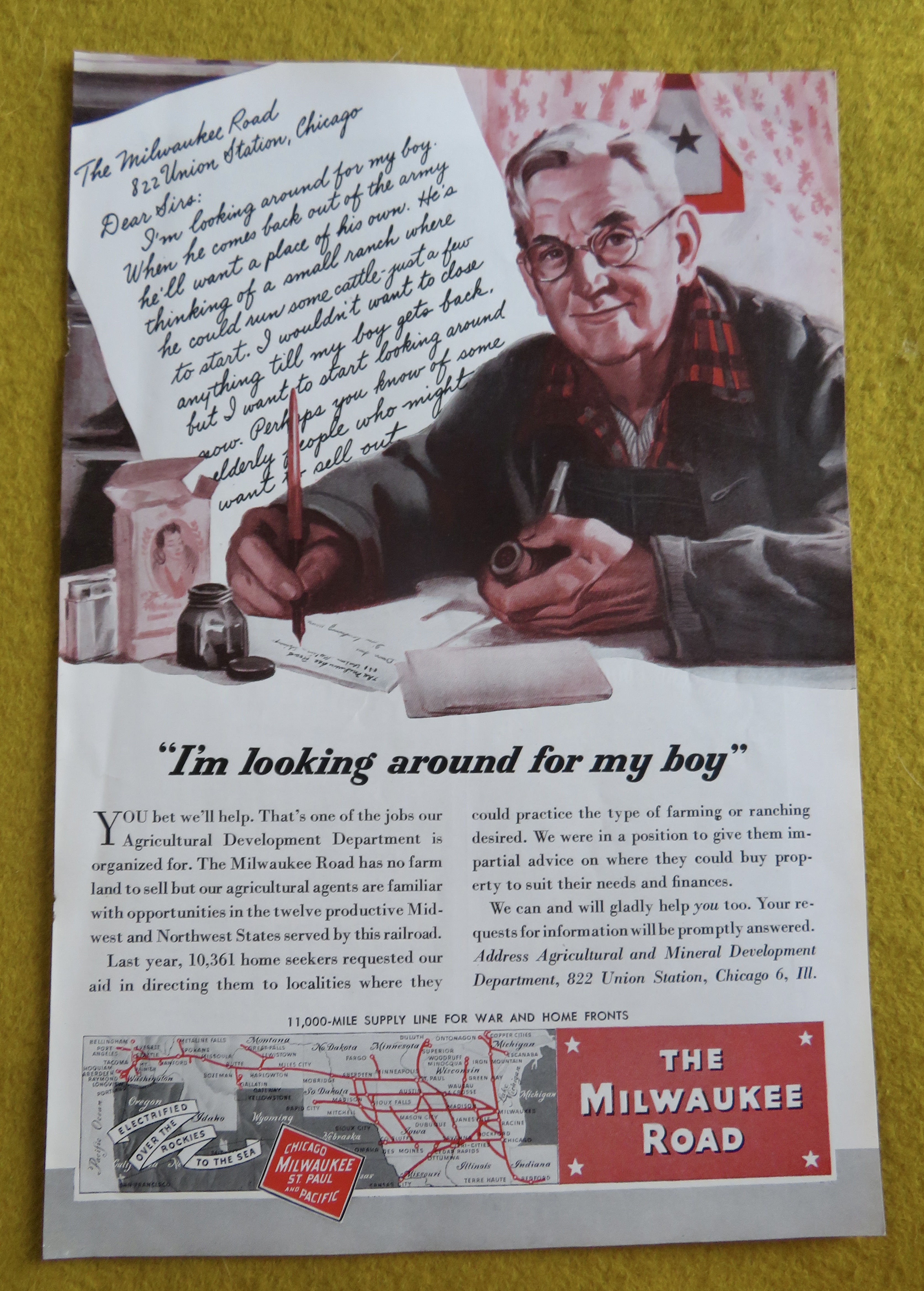 1945 Milwaukee Road with Man Writing Letter
