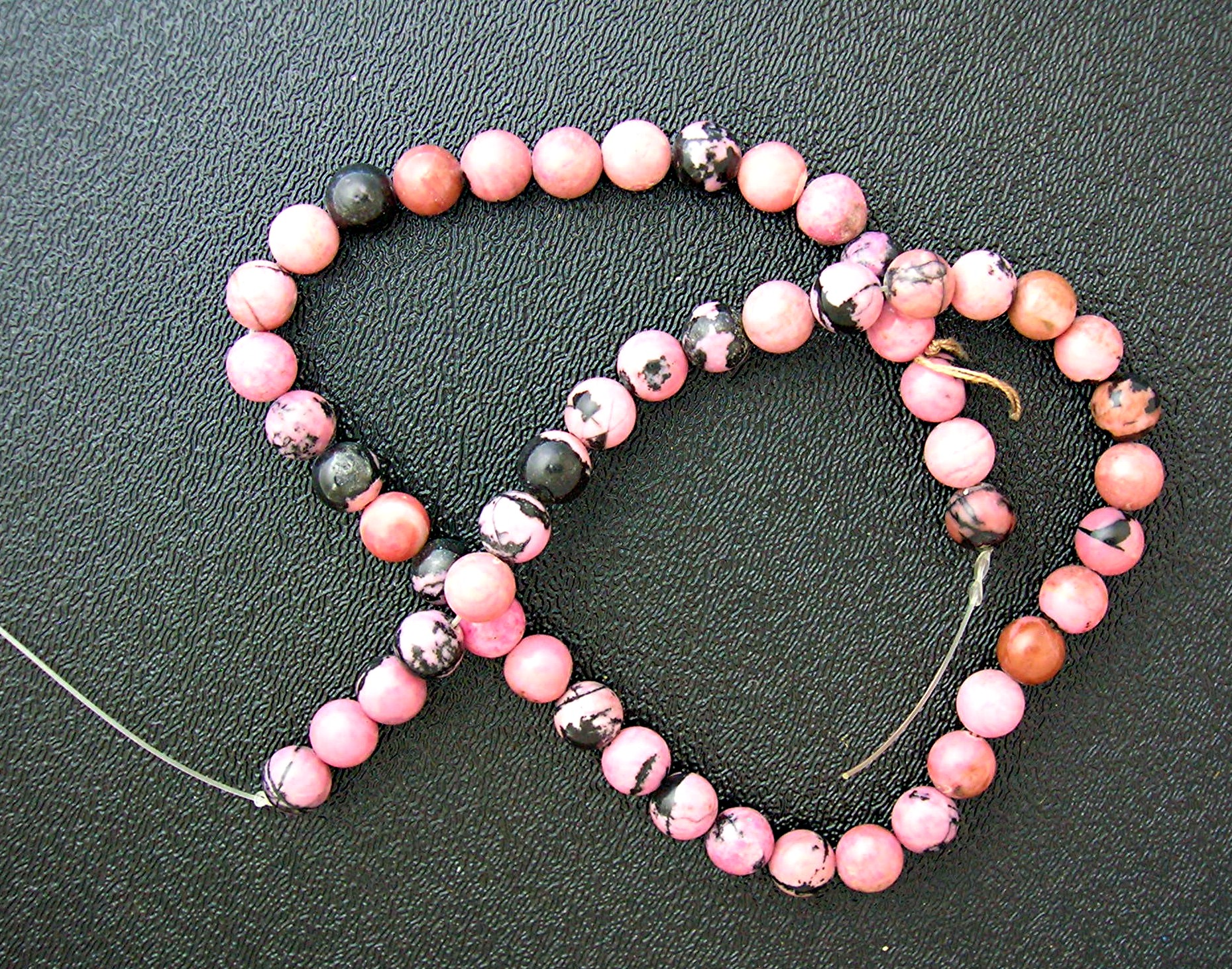 Rhodocrosite Pink Black Beads Unstrung