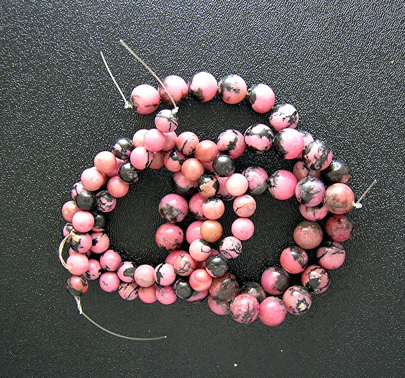 Rhodocrosite Pink Black Beads Unstrung