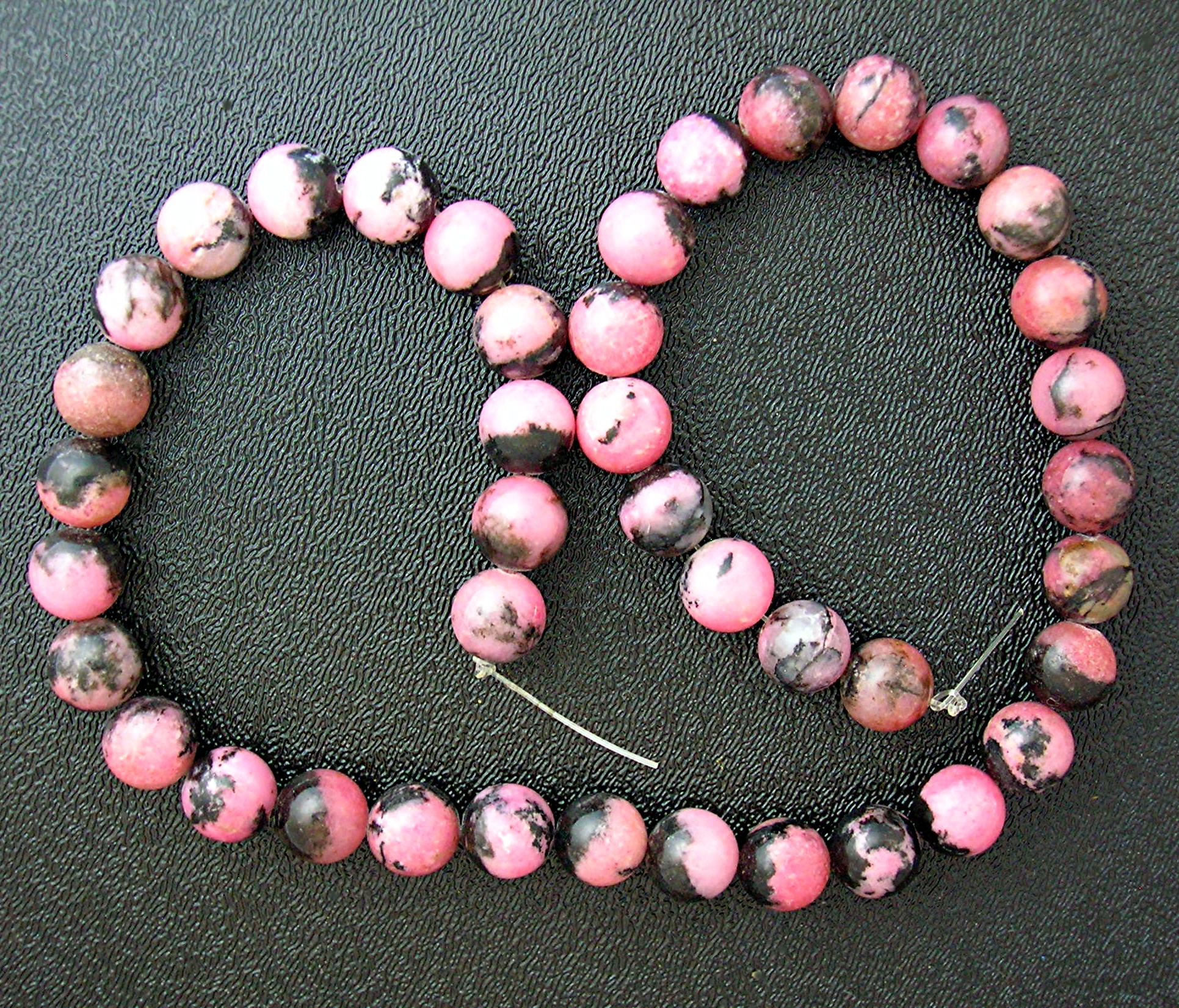 Rhodocrosite Pink Black Beads Unstrung