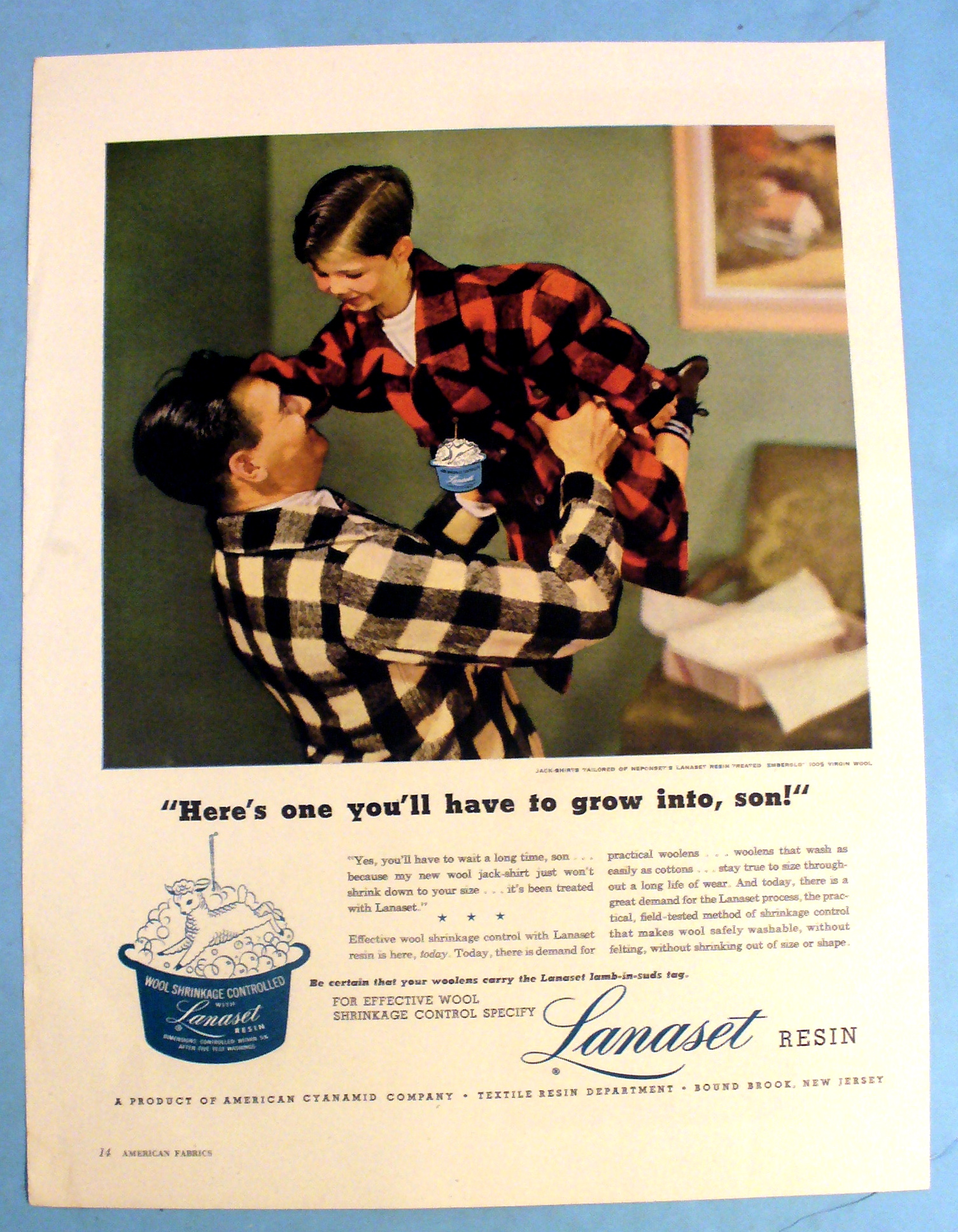1947 Lanaset Resin with Man Picking up a Boy
