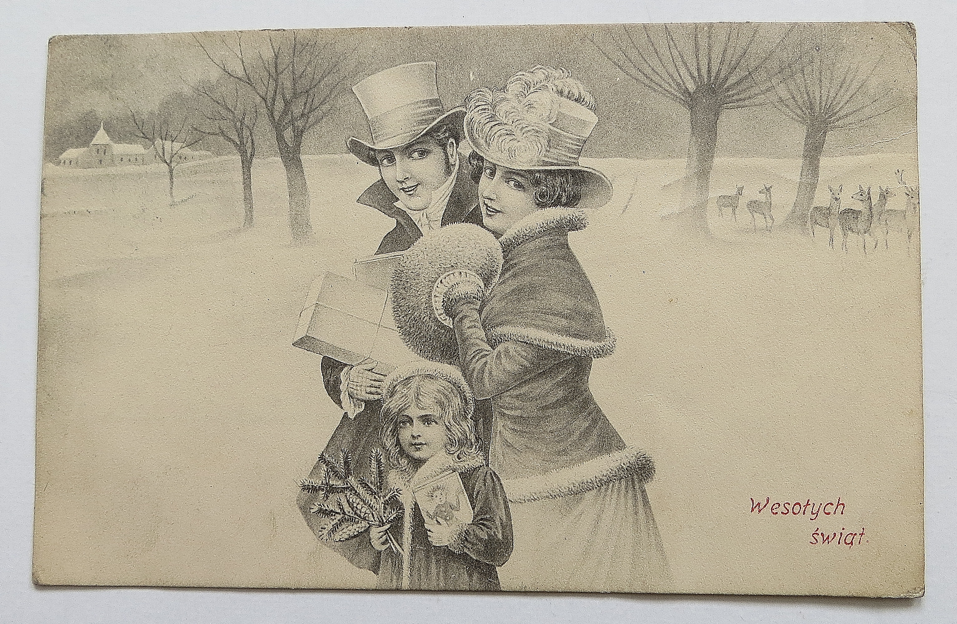 Family Walking In The Winter Snow
