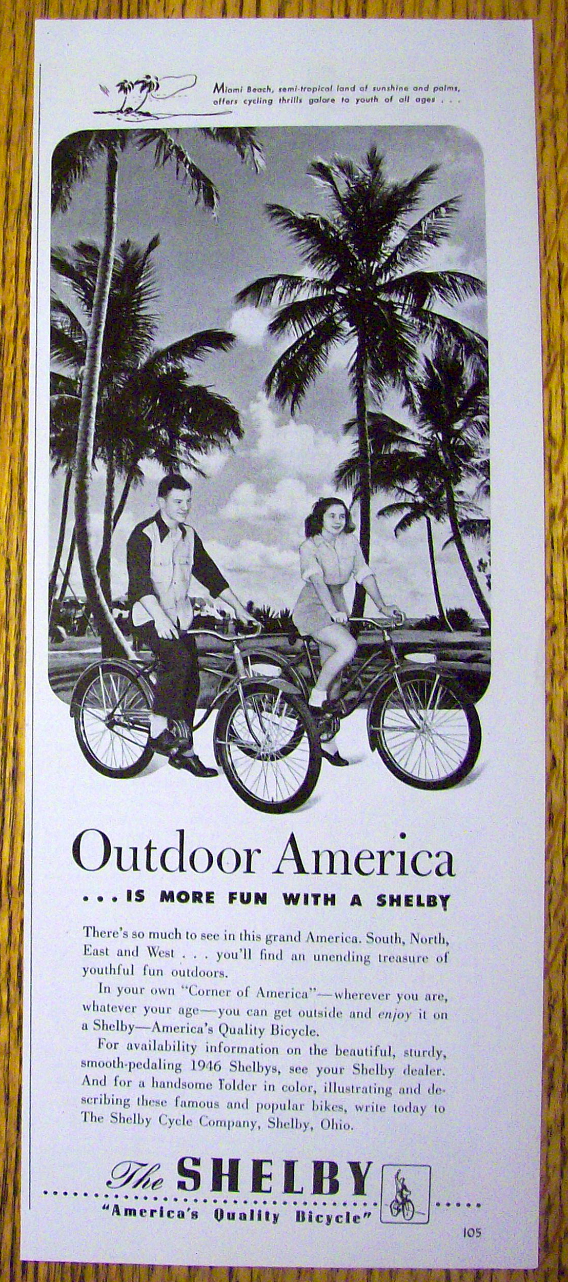 1946 Shelby Bicycles with Boy & Girl Riding On Bicycles