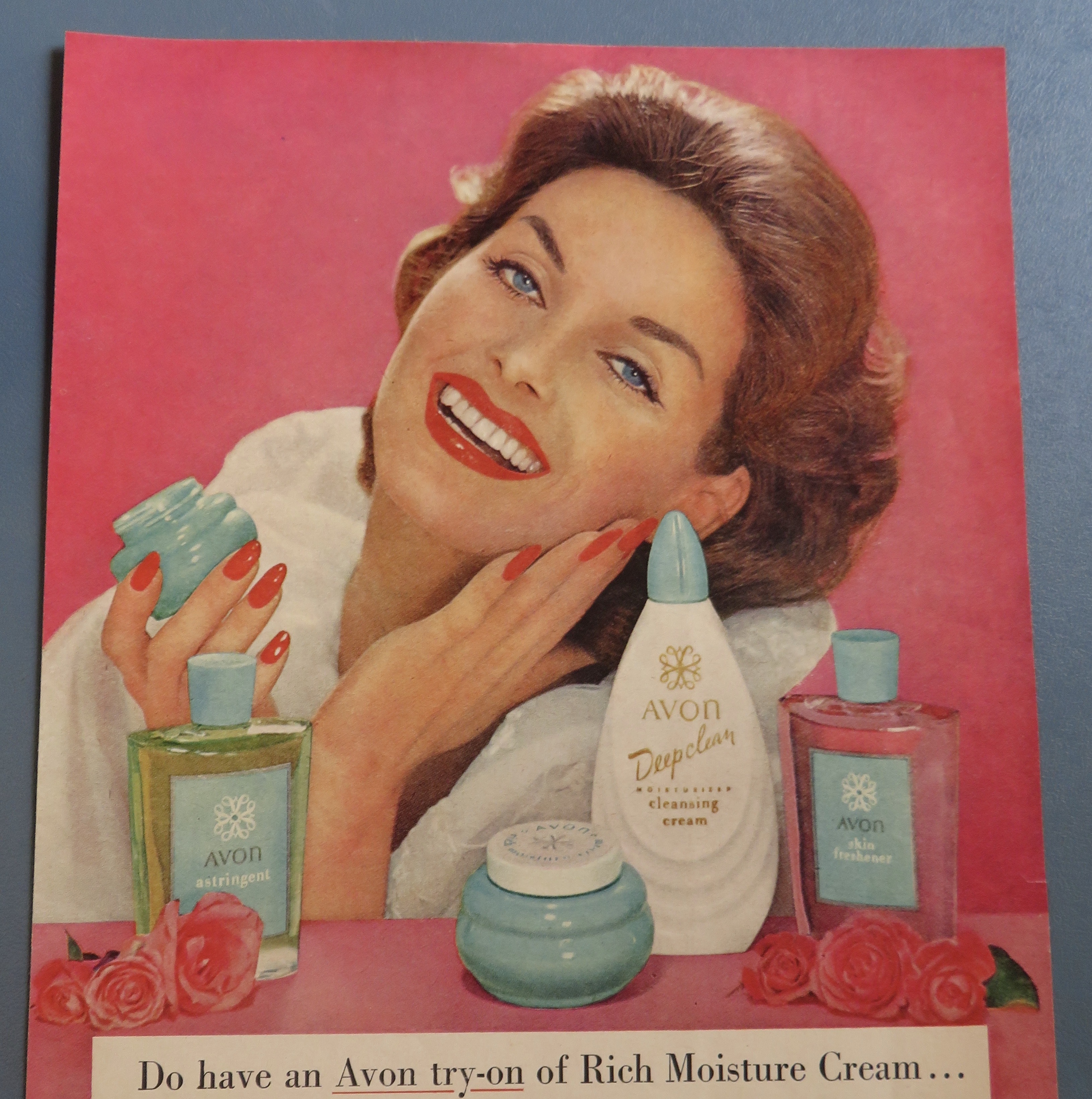 1958 Avon Cosmetics with Woman Putting Cream On Face
